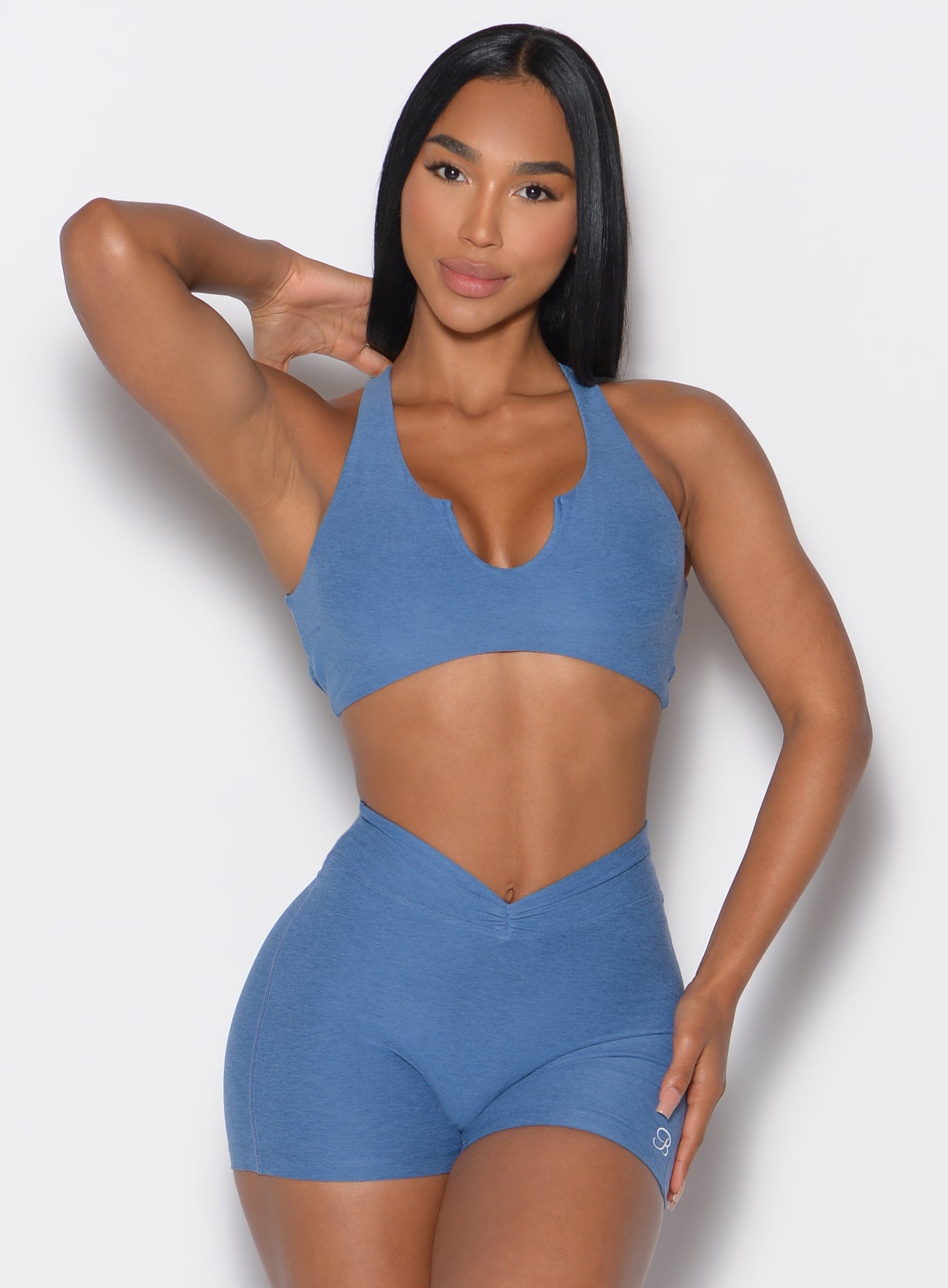 Chambray Ace Sports Bra with a sexy V-cut neckline and supportive lifting fit for gym sessions.