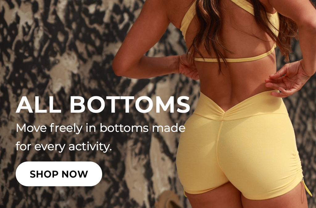 Text reads "ALL BOTTOMS Move freely in bottoms made for every activity" Image of a model wearing a yellow sports bra and shorts with text promoting athletic wear.