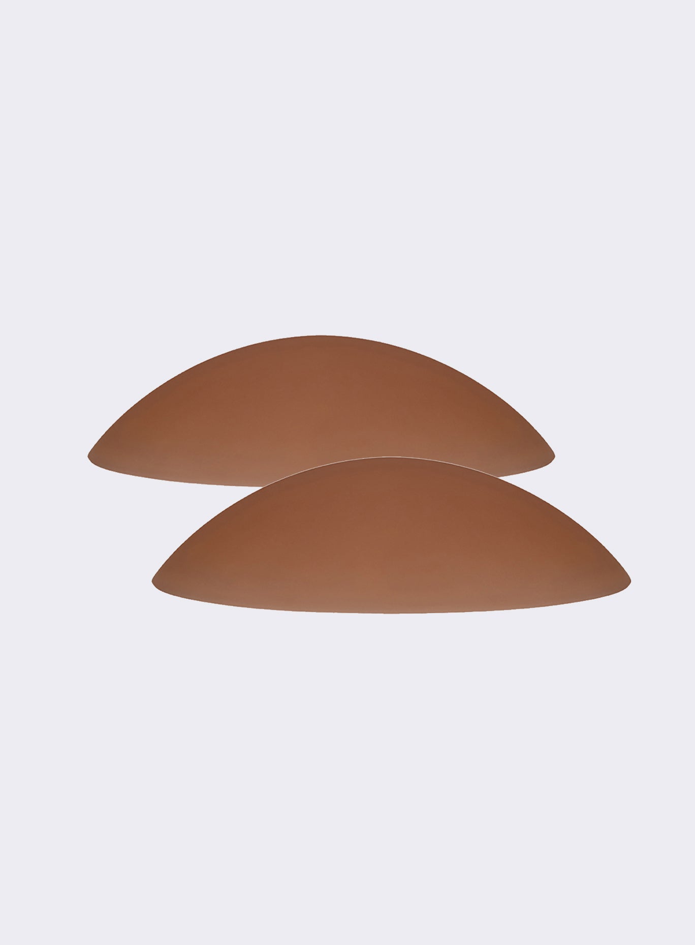 Espresso Nippies nipple covers; seamless, medical-grade silicone for a smooth gym look.