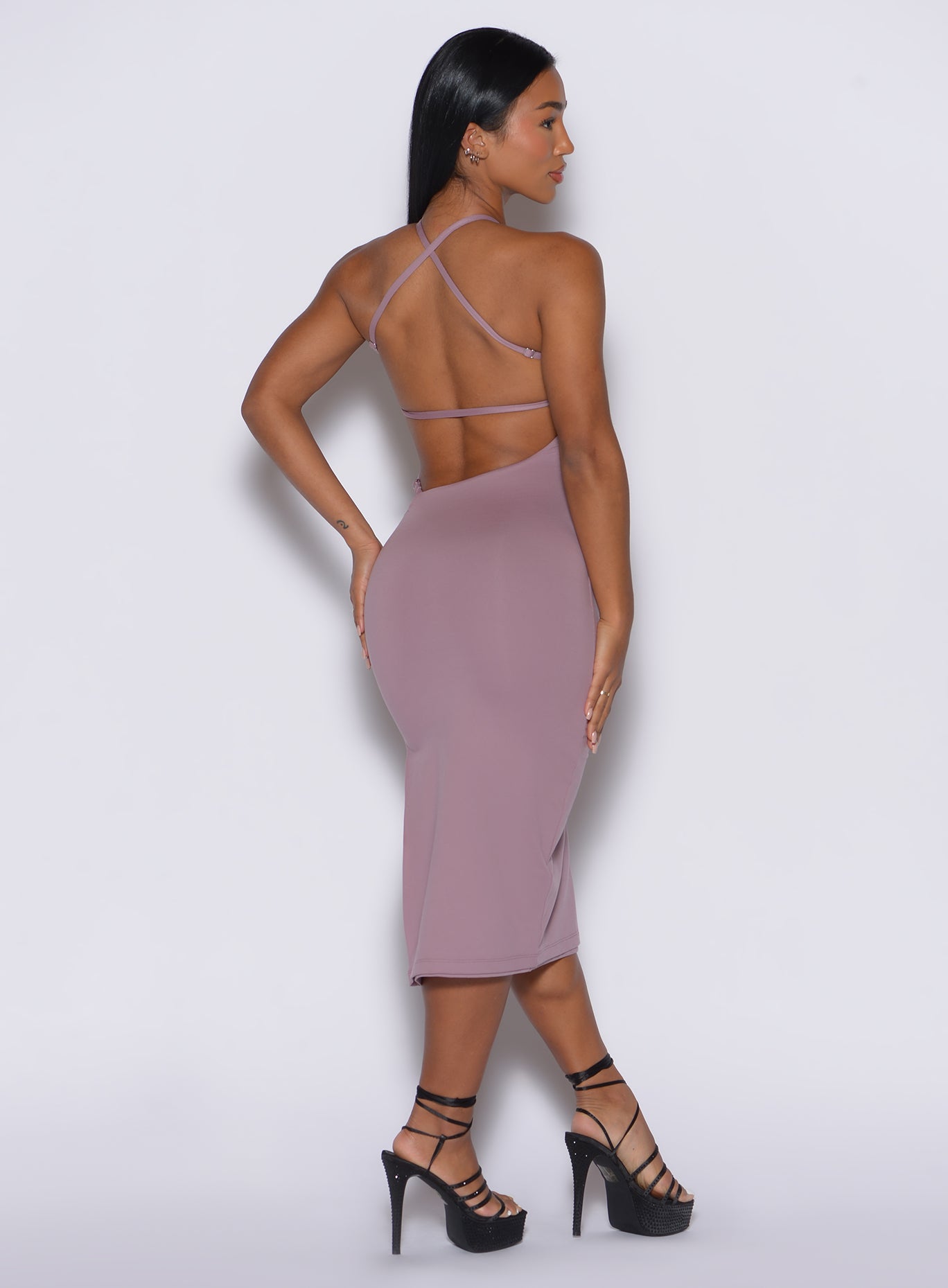 Light mauve Bombshell Bunny Dress with a low-cut back and sculpting fit for an evening silhouette.