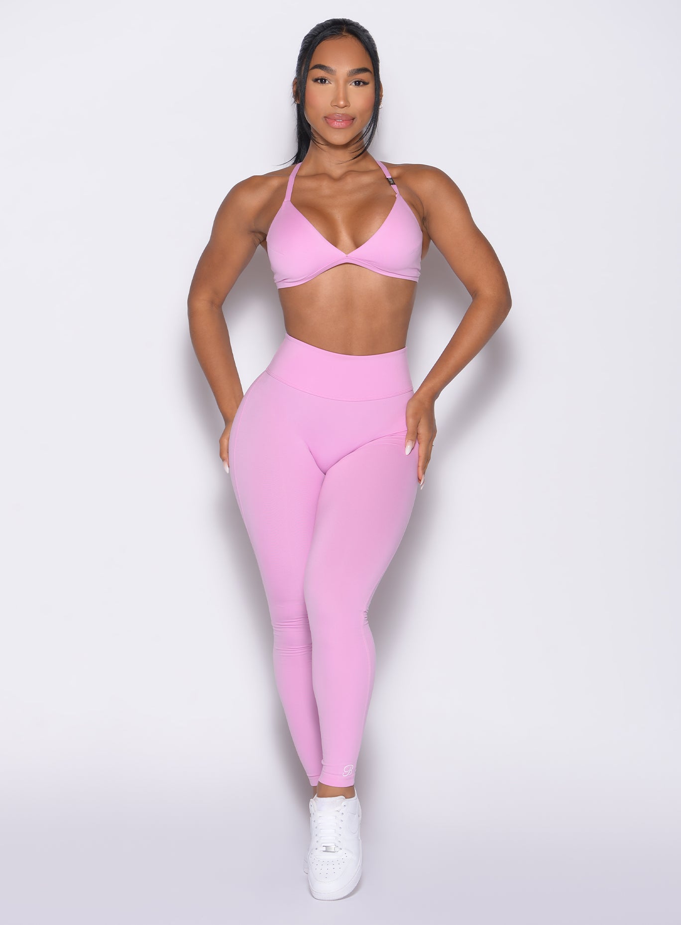 front profile view of a model wearing the Bombshell Bunny Leggings in Lilac Chiffon color