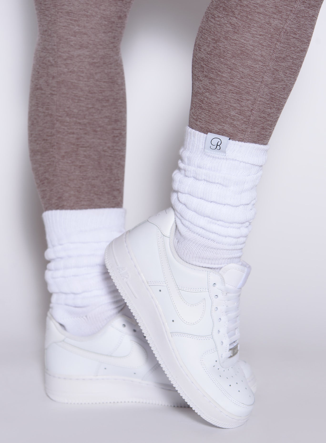 White Slouch Socks featuring a premium ribbed knit and heavy texture for a retro gym aesthetic.
