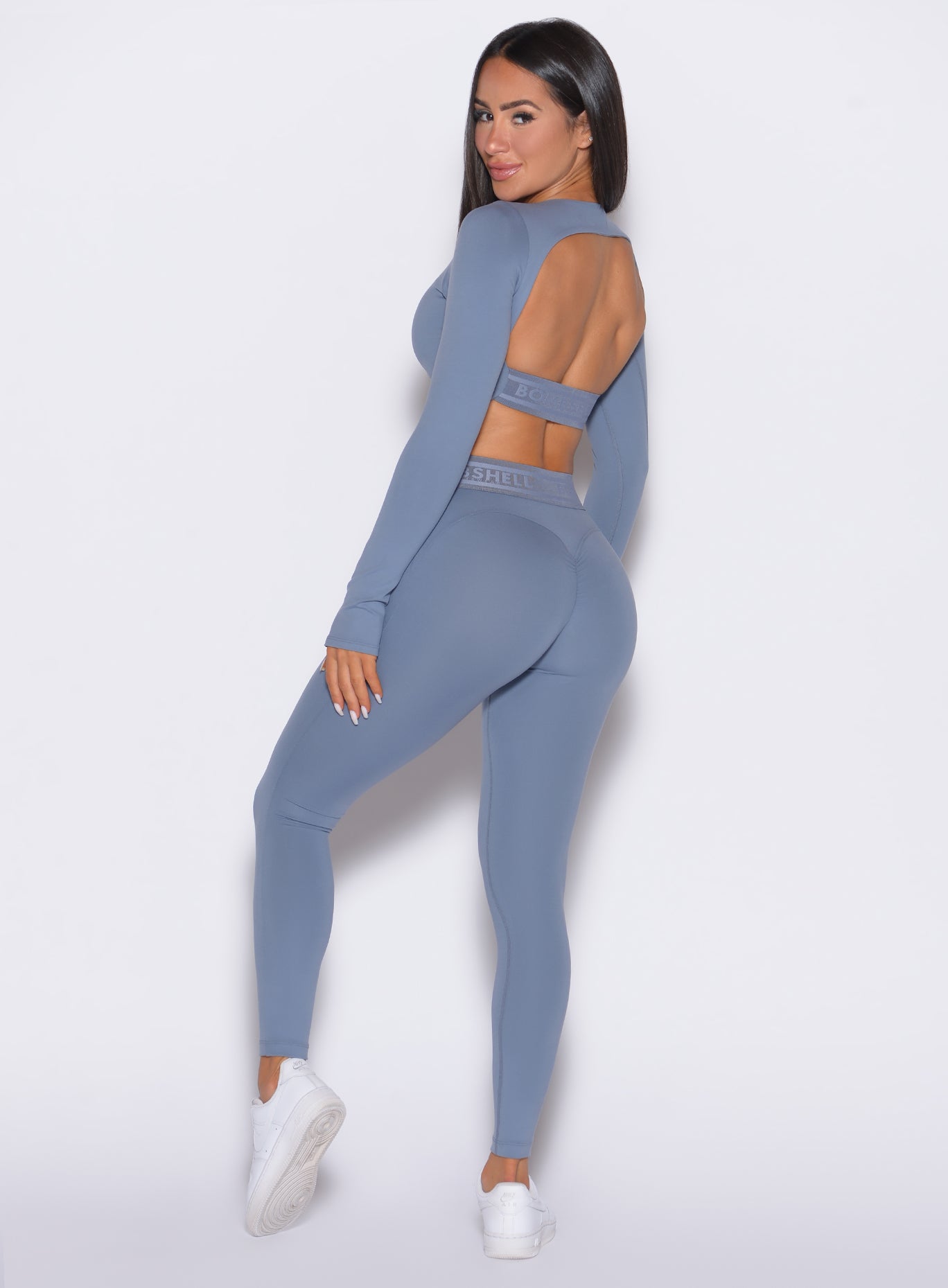 Sculpting Flinstone Bombshell Active Leggings with branded elastic waistband and scrunch butt.
