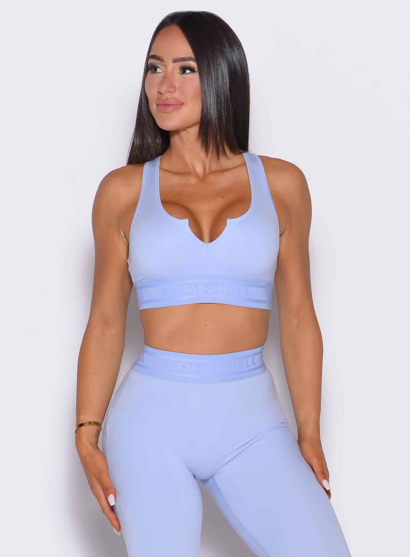Baby Lavender Bombshell Active Bra with V-cut front and logo elastic for high-performance gym sessions.
