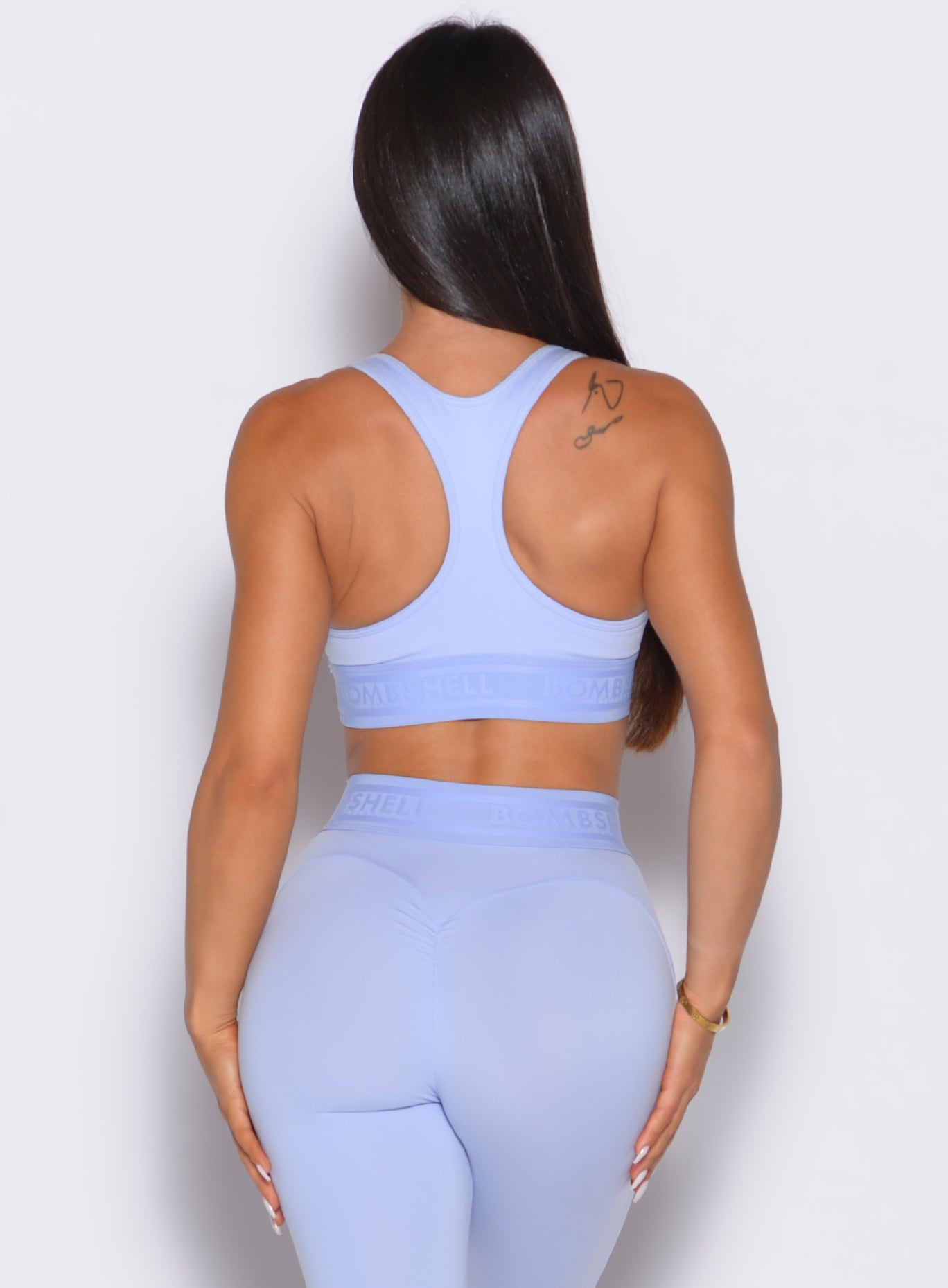 Baby Lavender Bombshell Active Bra with logo elastic underbust and supportive racerback.