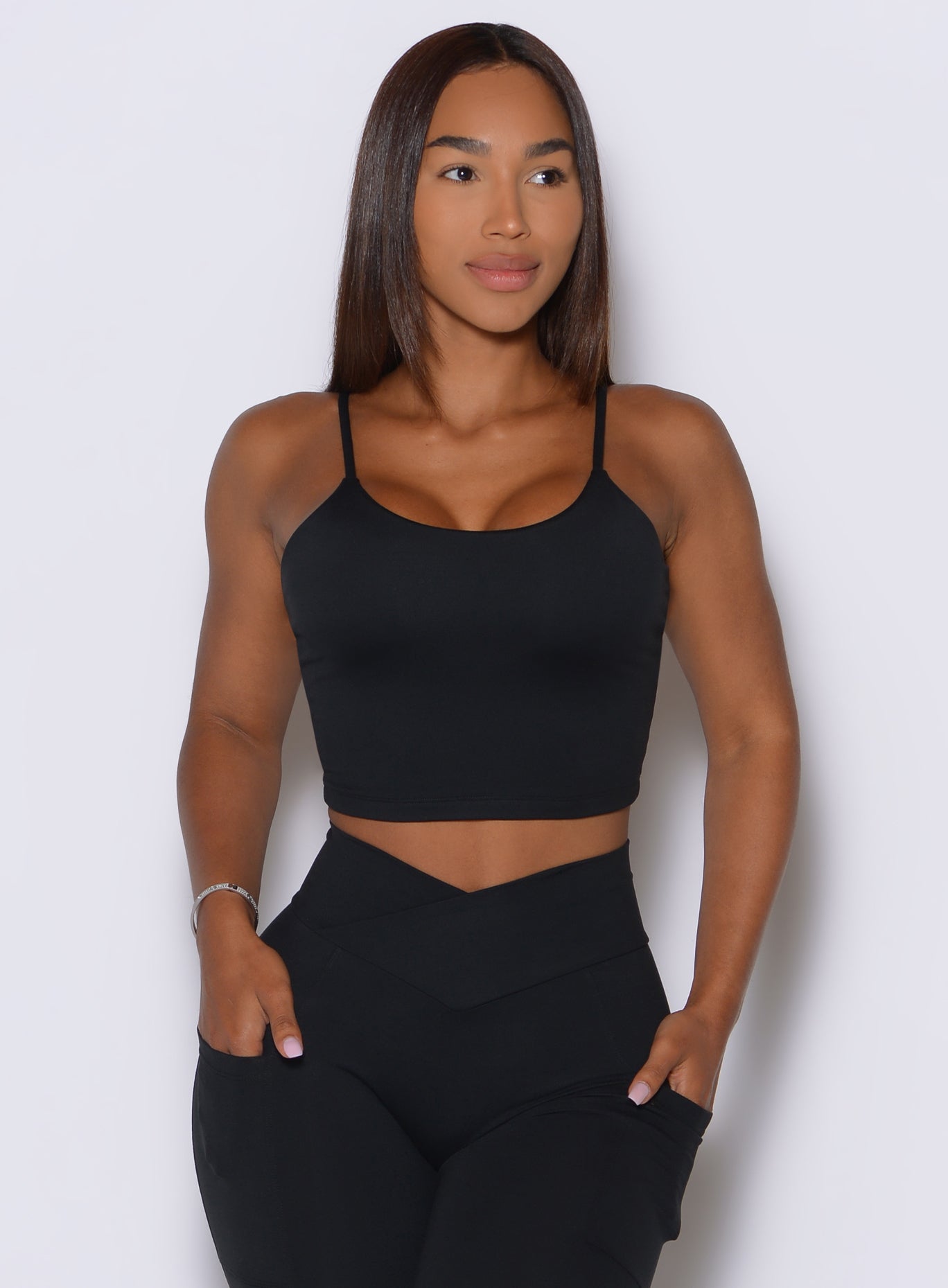 Cinch Cami Tank in Black features a sleek fit and double-layer front for smooth coverage