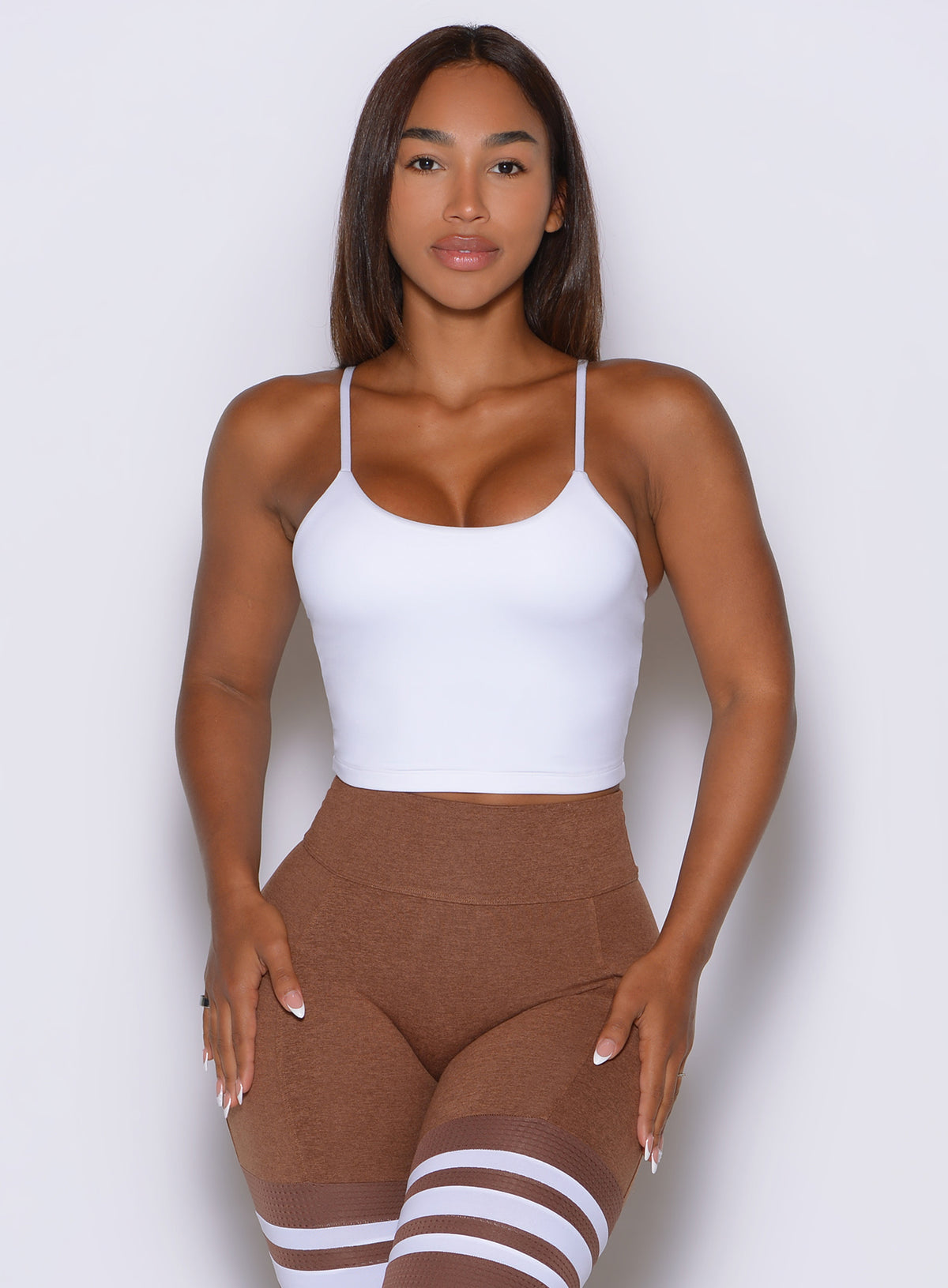 A minimal white silhouette makes the Cinch Cami Tank an easy choice for workouts or everyday wear
