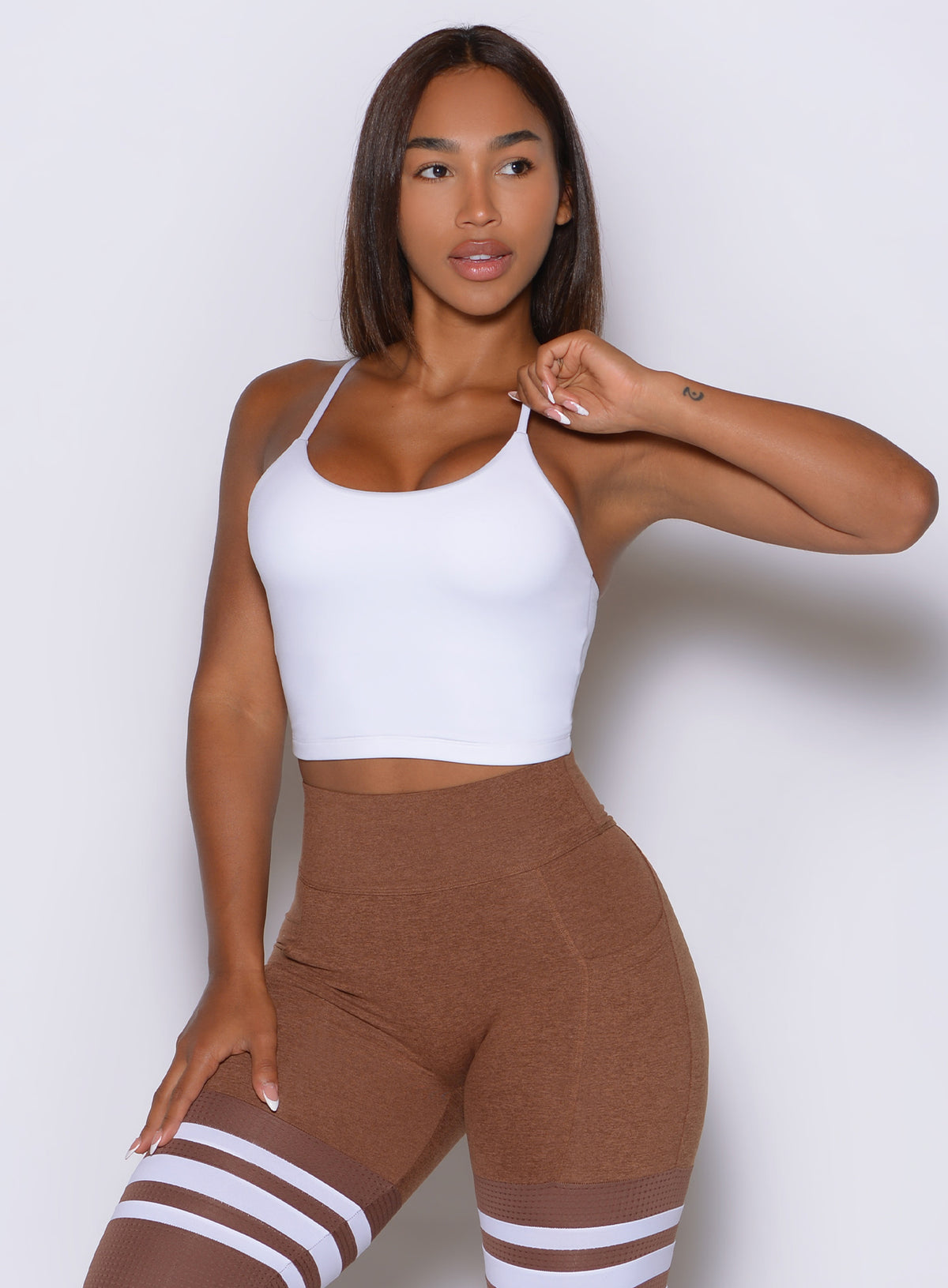 The Cinch Cami Tank in white delivers smooth coverage with a clean, body-hugging fit