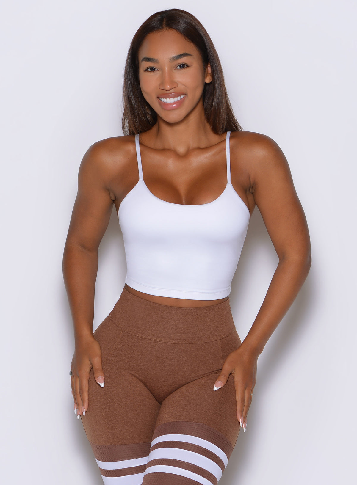 White Cinch Cami Tank pairs a feminine neckline with a sleek, sculpted silhouette