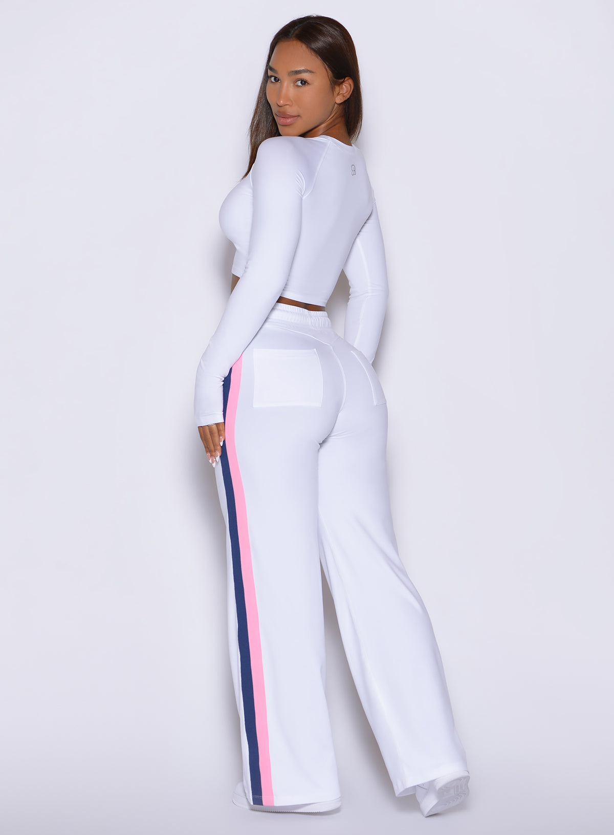 Bombshell Sportswear White Club Lounge Pants featuring flattering rear seam and side knit trim.