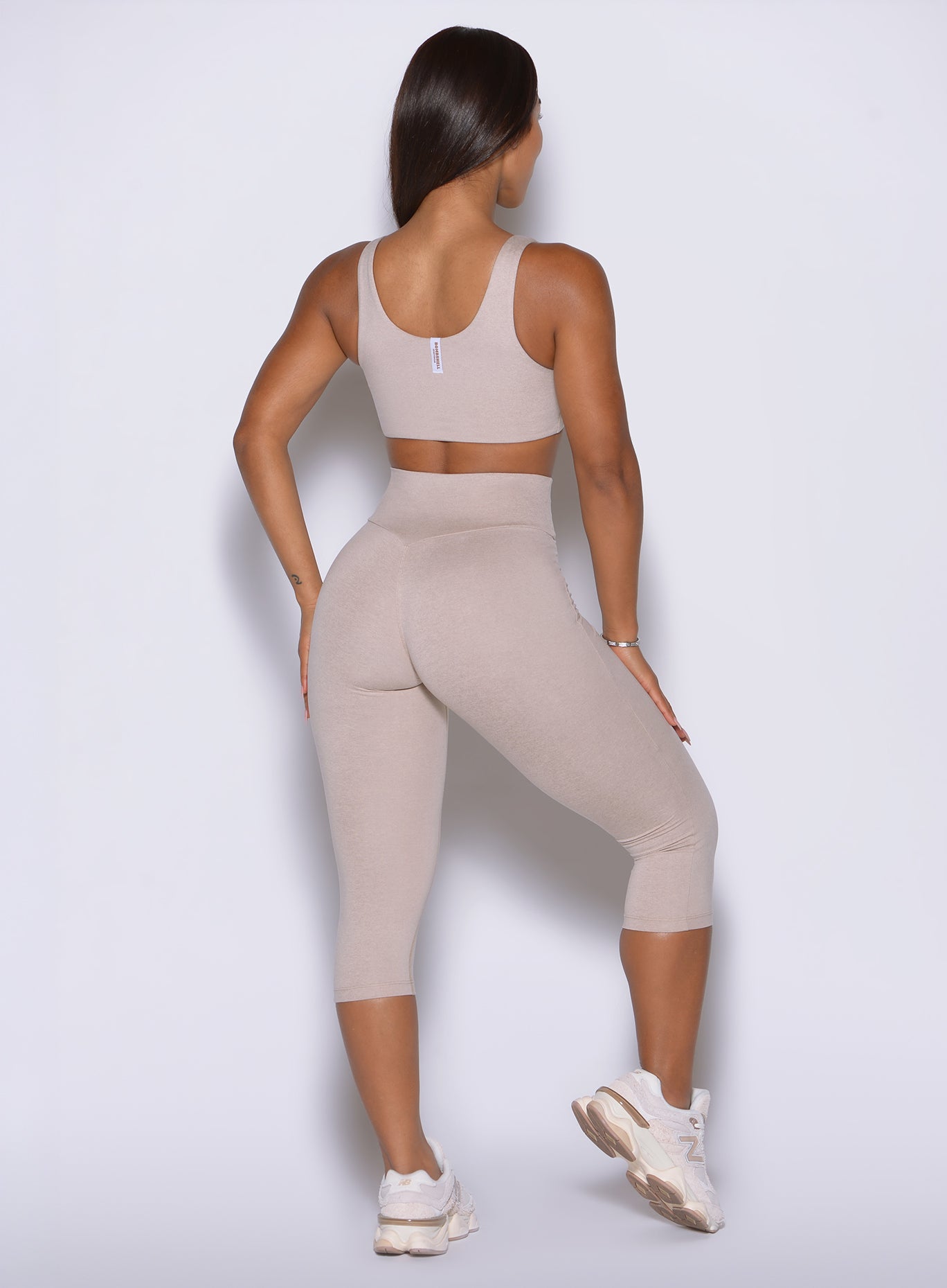 Taupe Contour Capri Leggings feature signature lift tech for a confident silhouette