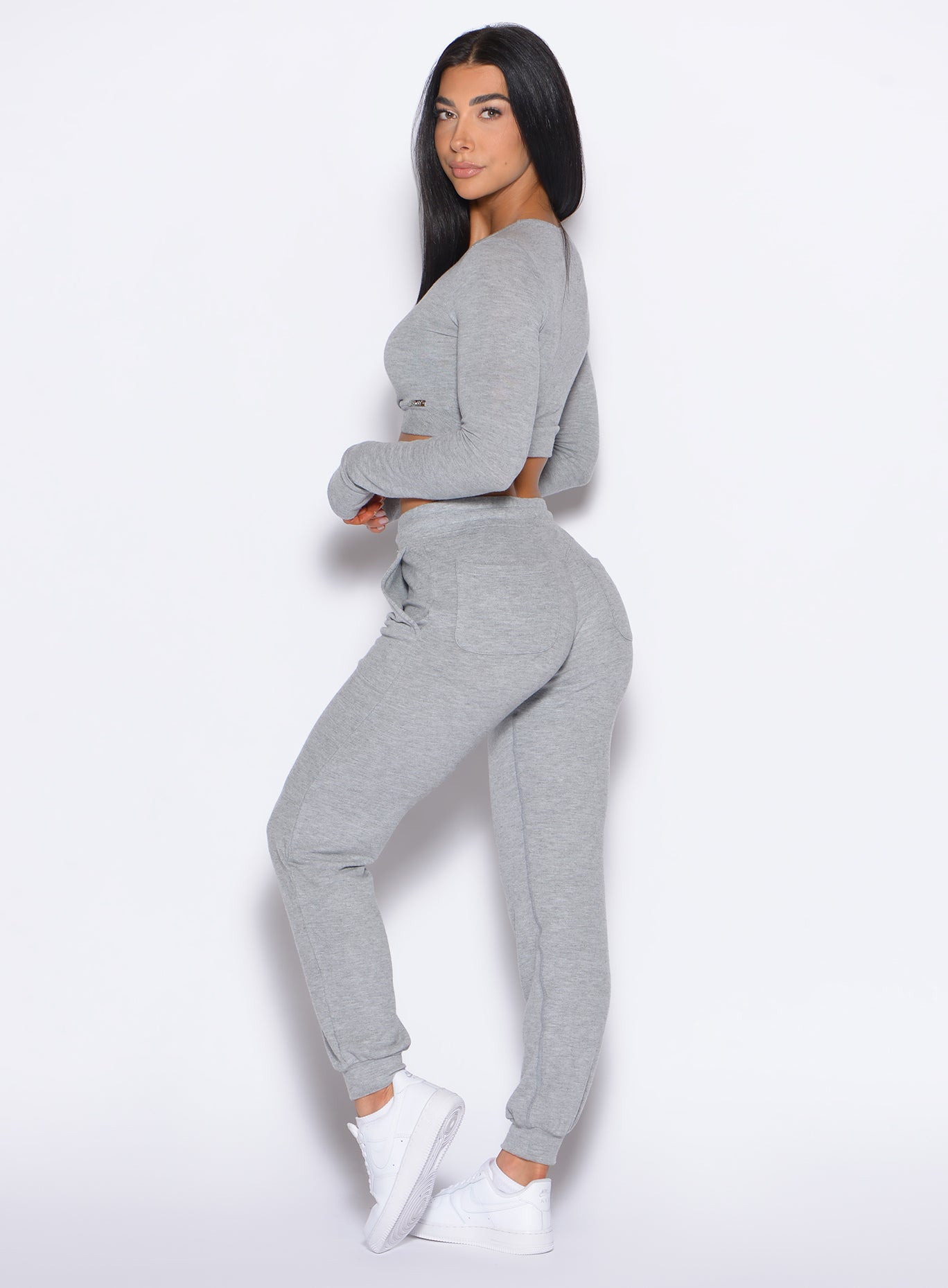 Heathered Cozy Silver Cuddle Up Joggers with flattering butt pockets for a chic, sculpted lounge.