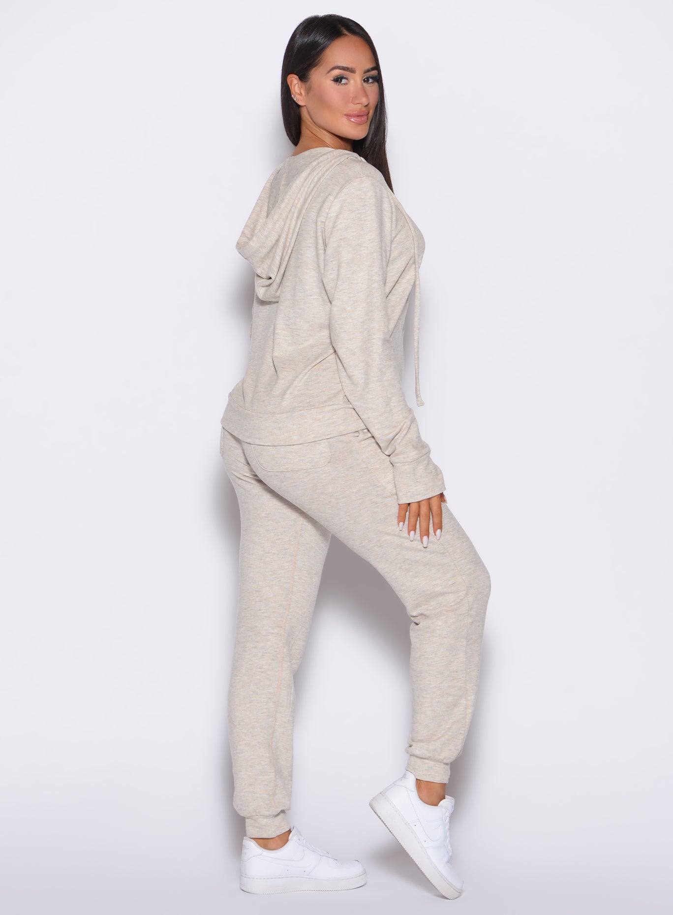 Cozy Oat Cuddle Up Joggers featuring a high-waisted ruched band and pockets for premium relaxation.