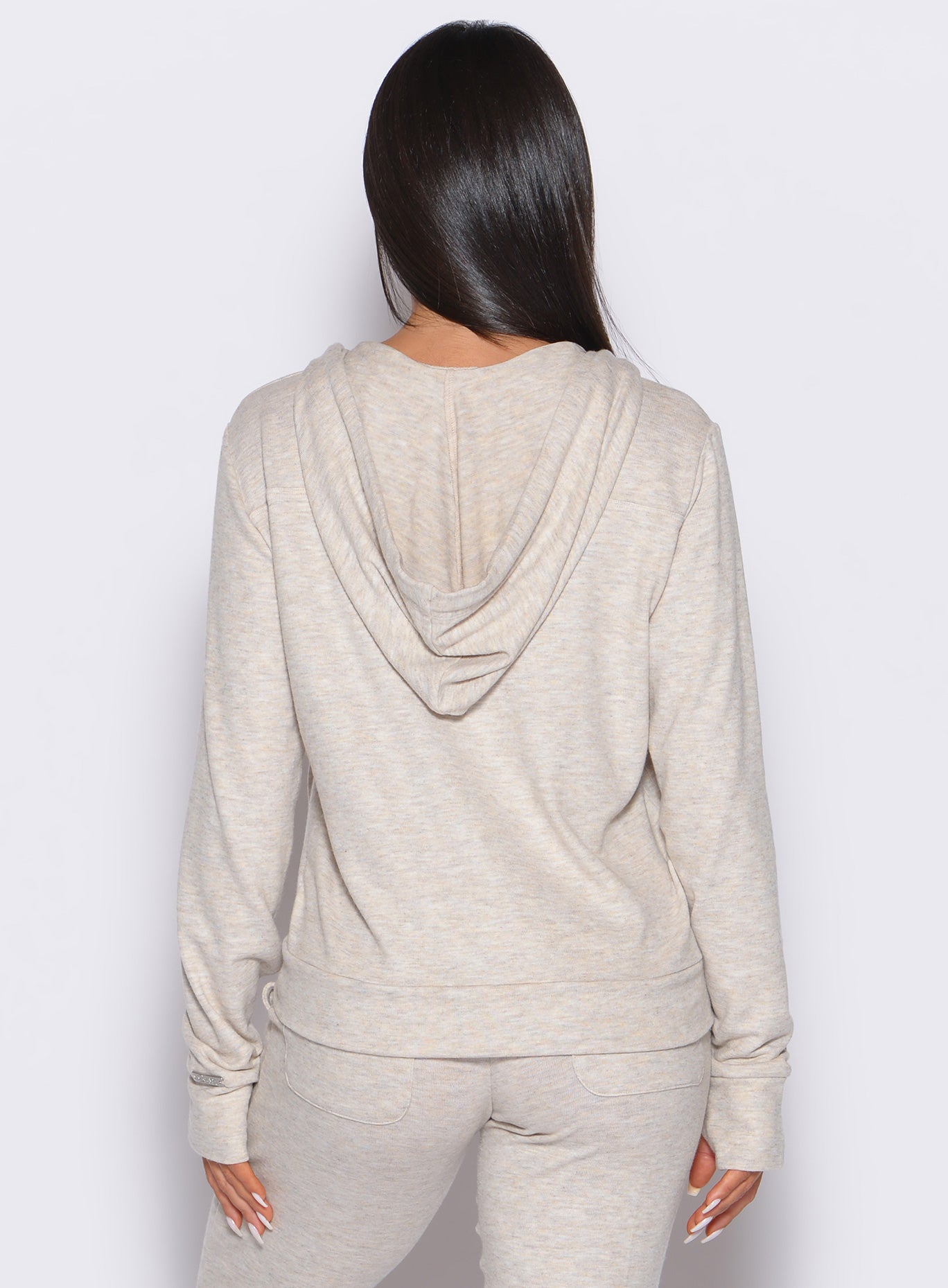 Cozy Oat Gym Crush Hoodie with full-front zipper and thumbholes for effortless warmups.