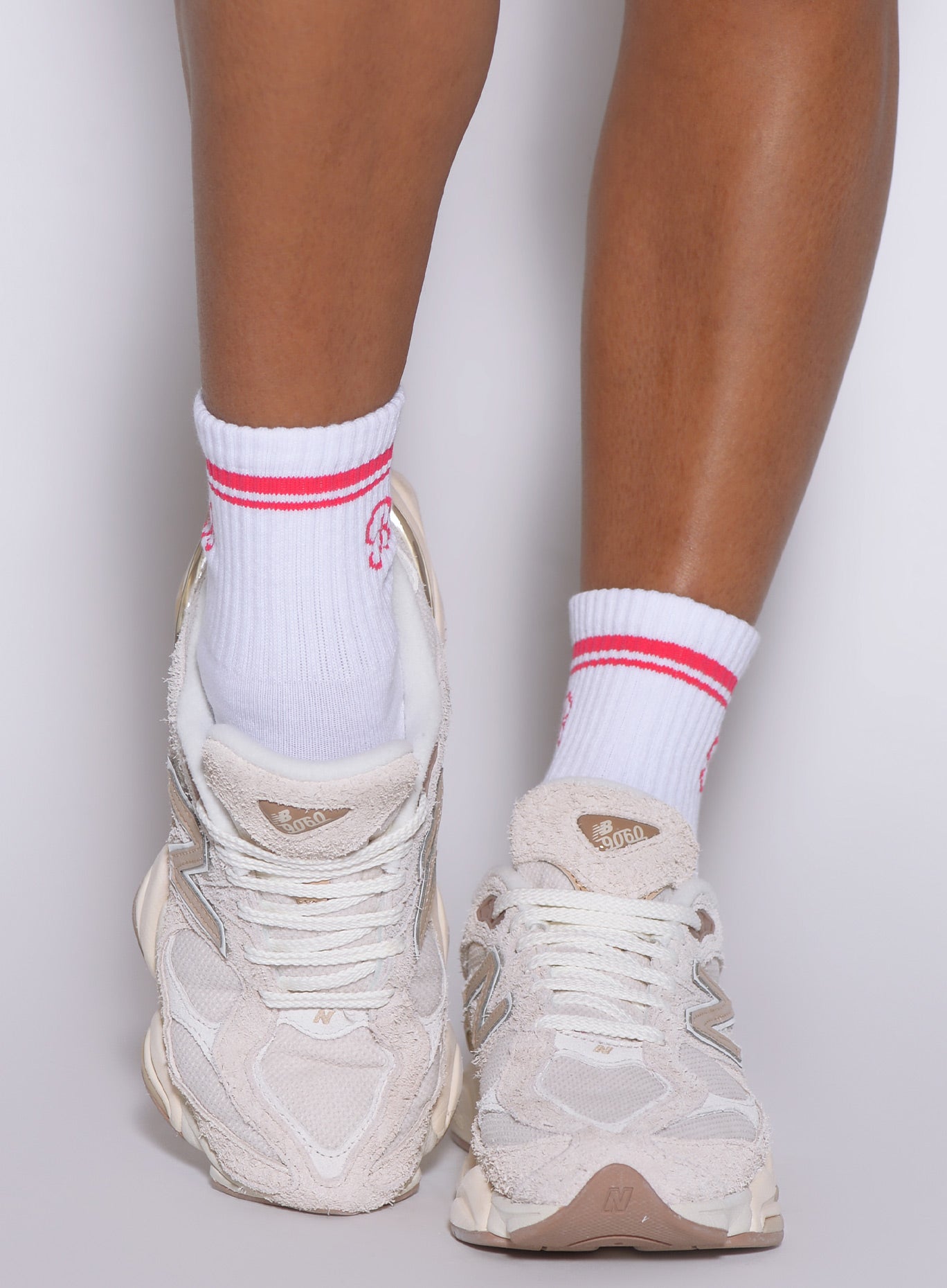 Close-up frontal view of Raspberry Punch Crew Socks featuring a ribbed texture and soft knit.