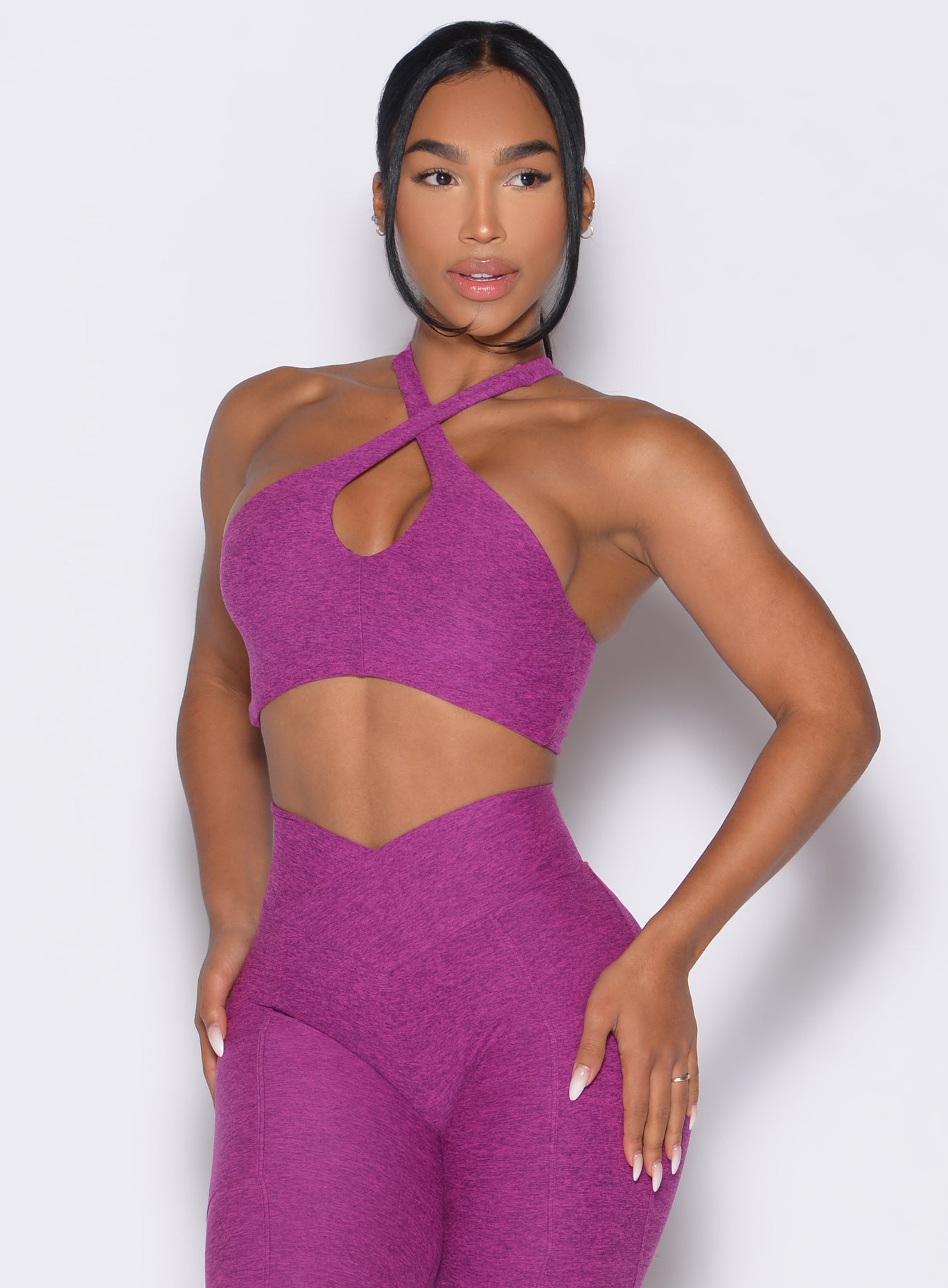 Bright Plum Cross Over Halter Bra with a skinny racerback for stylish, high-performance training.