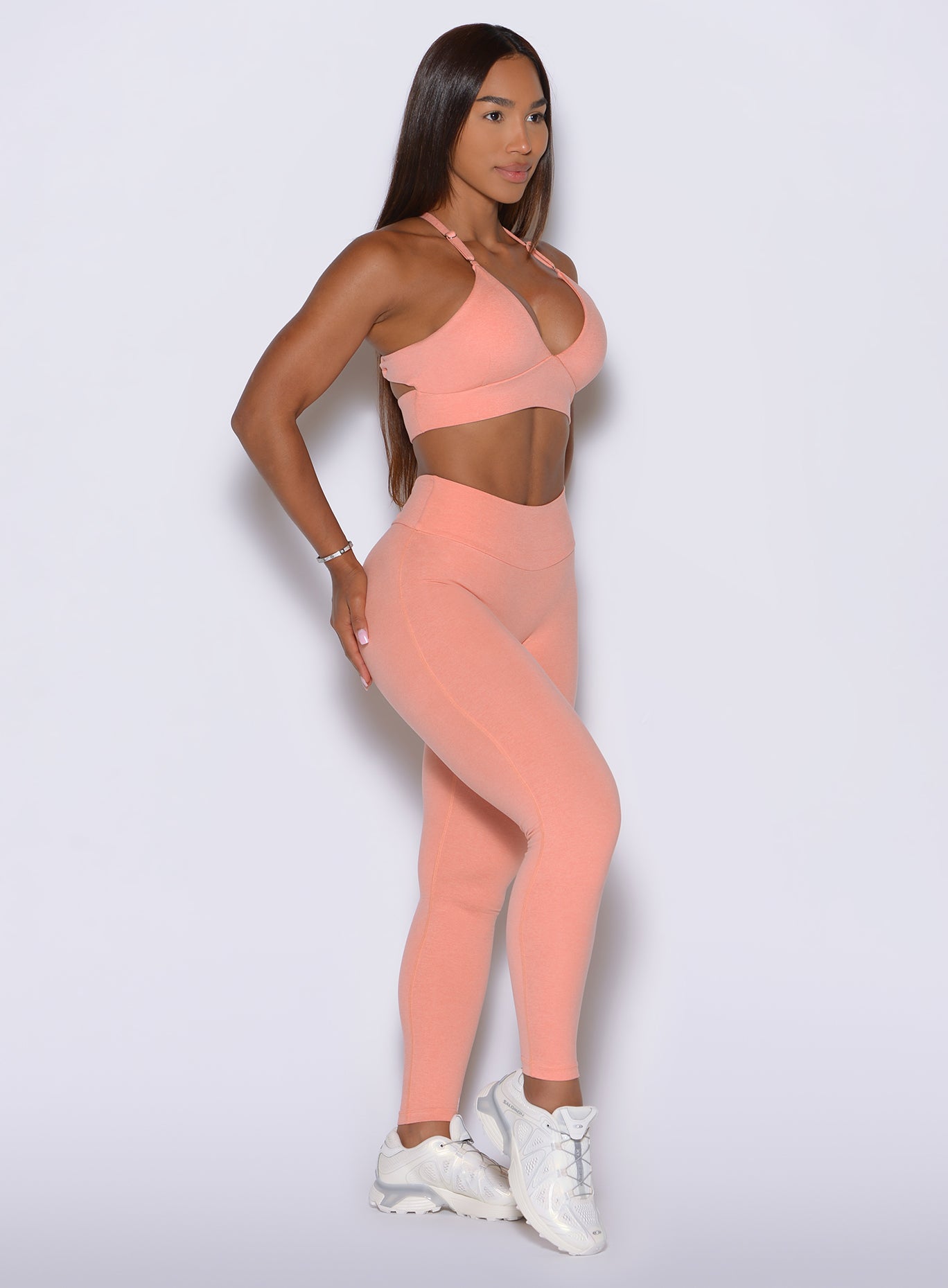 Coral Peach CurvePro performance leggings feature seamless front styling and 4 way stretch.