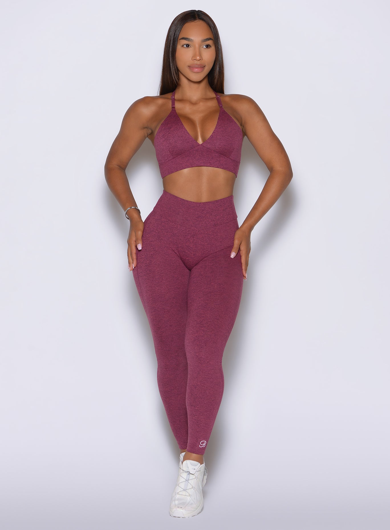 A front standing look highlights RaspberryRed CurvePro Leggings in a smooth heathered fit.
