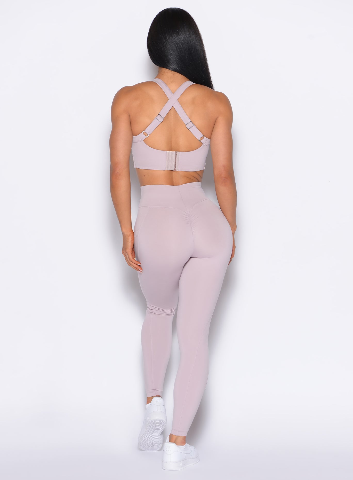 back profile view of our model wearing the Curves 2.0 Leggings in Violet Ice color