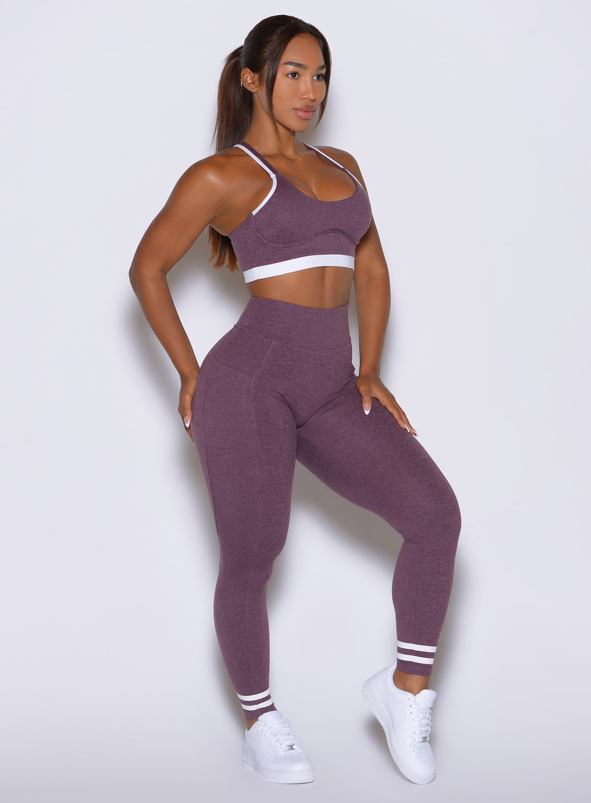 Bombshell Sportswear Regal Purple Curves Crew Leggings sculpt a sophisticated athletic silhouette.