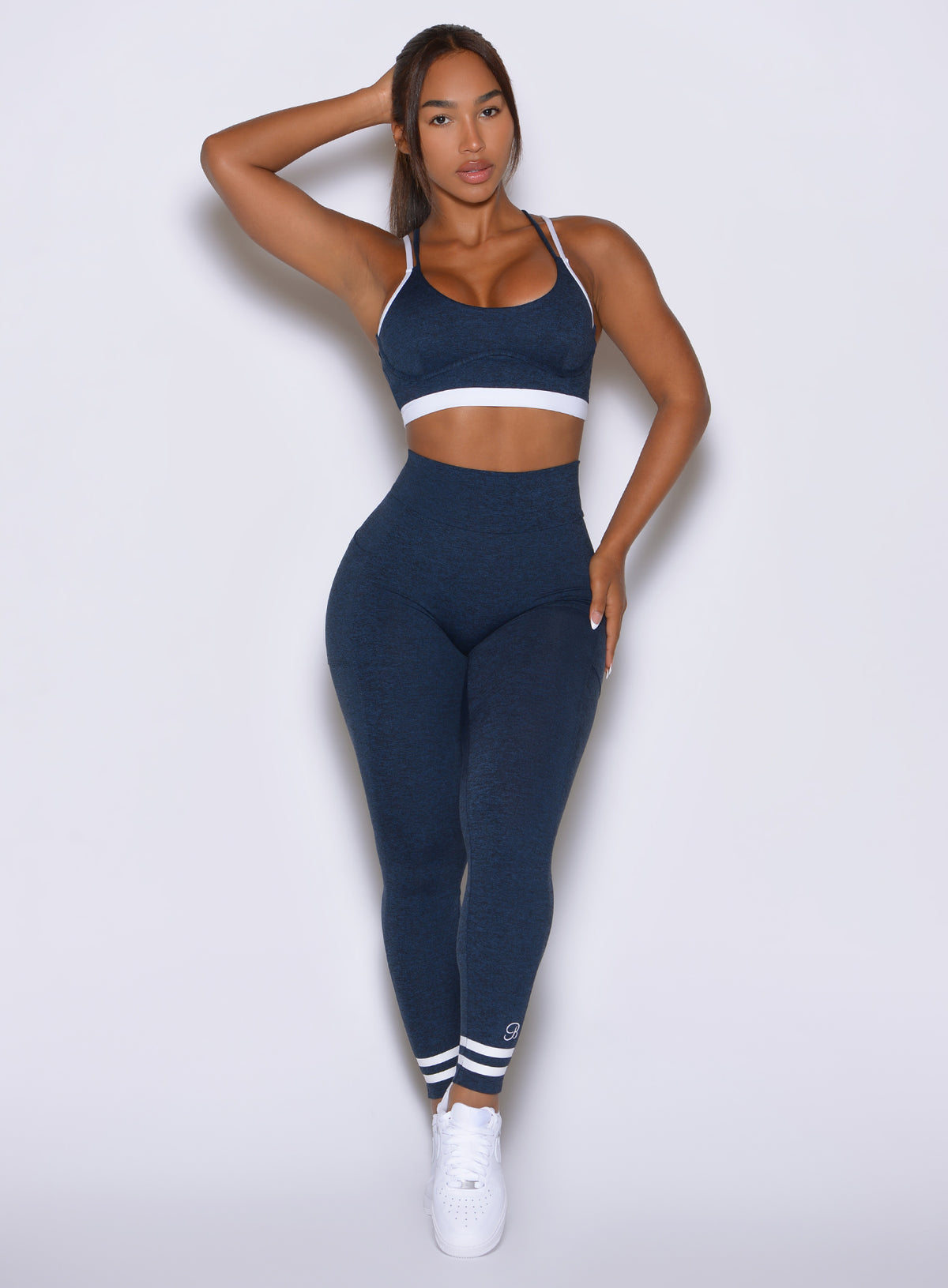 Bombshell Sportswear Sapphire Blue Curves Crew Leggings feature signature two-stripe ankle detail.