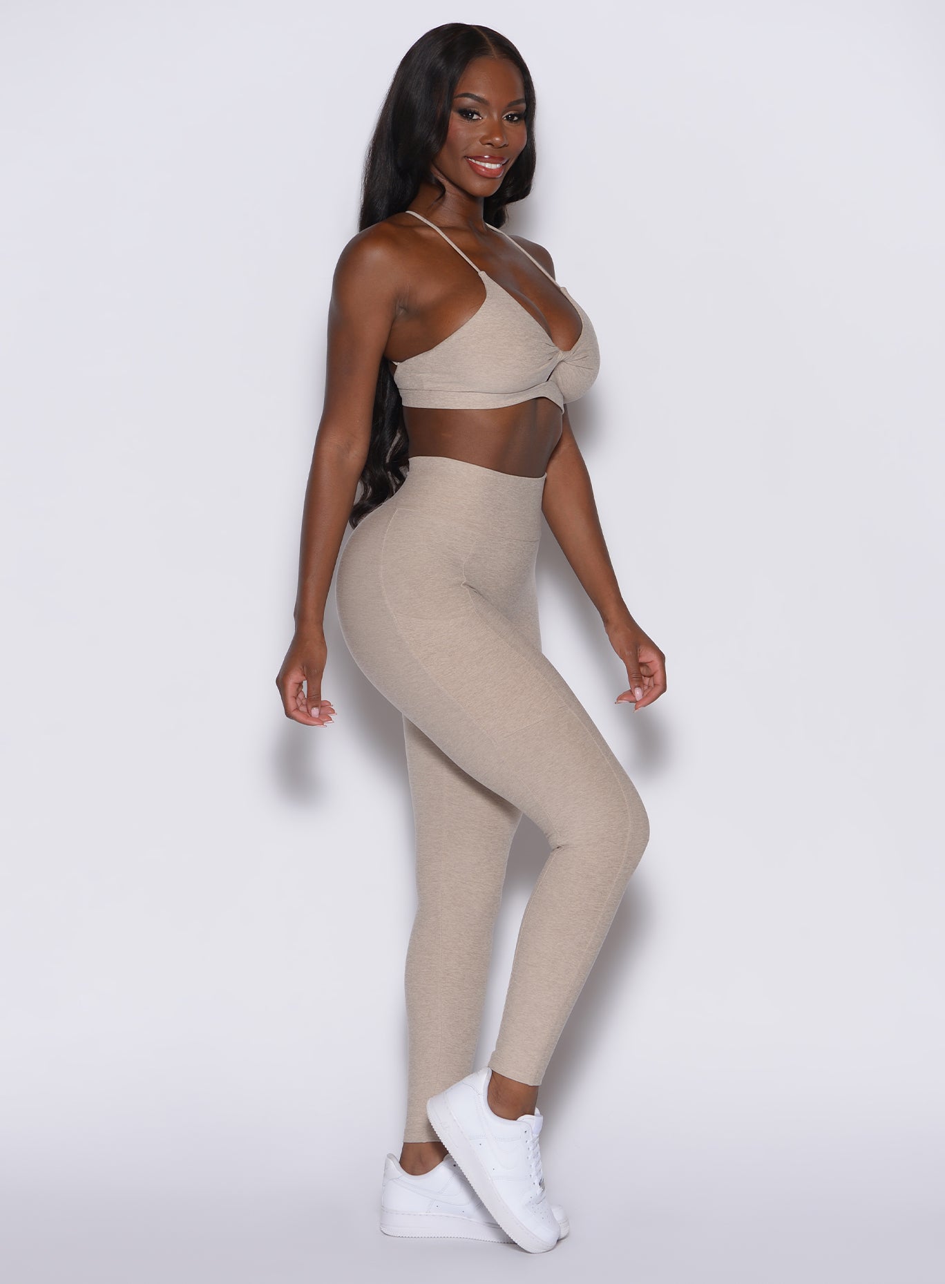 Taupe Curves Leggings in a side profile, featuring a scrunch booty and high-waisted fit.