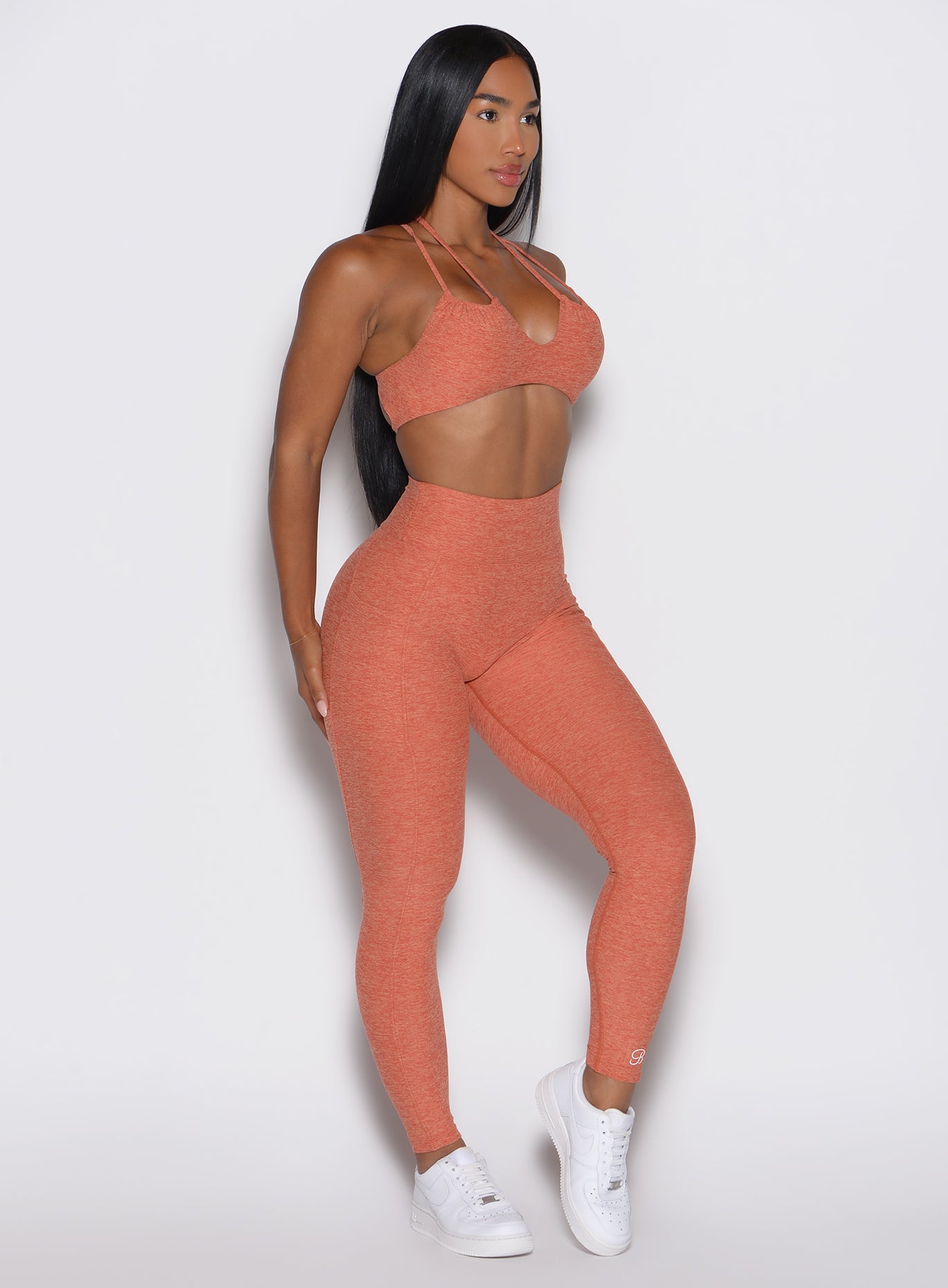 Spiced Maple Define Leggings featuring a high-waisted, sculpting fit and functional side pockets.