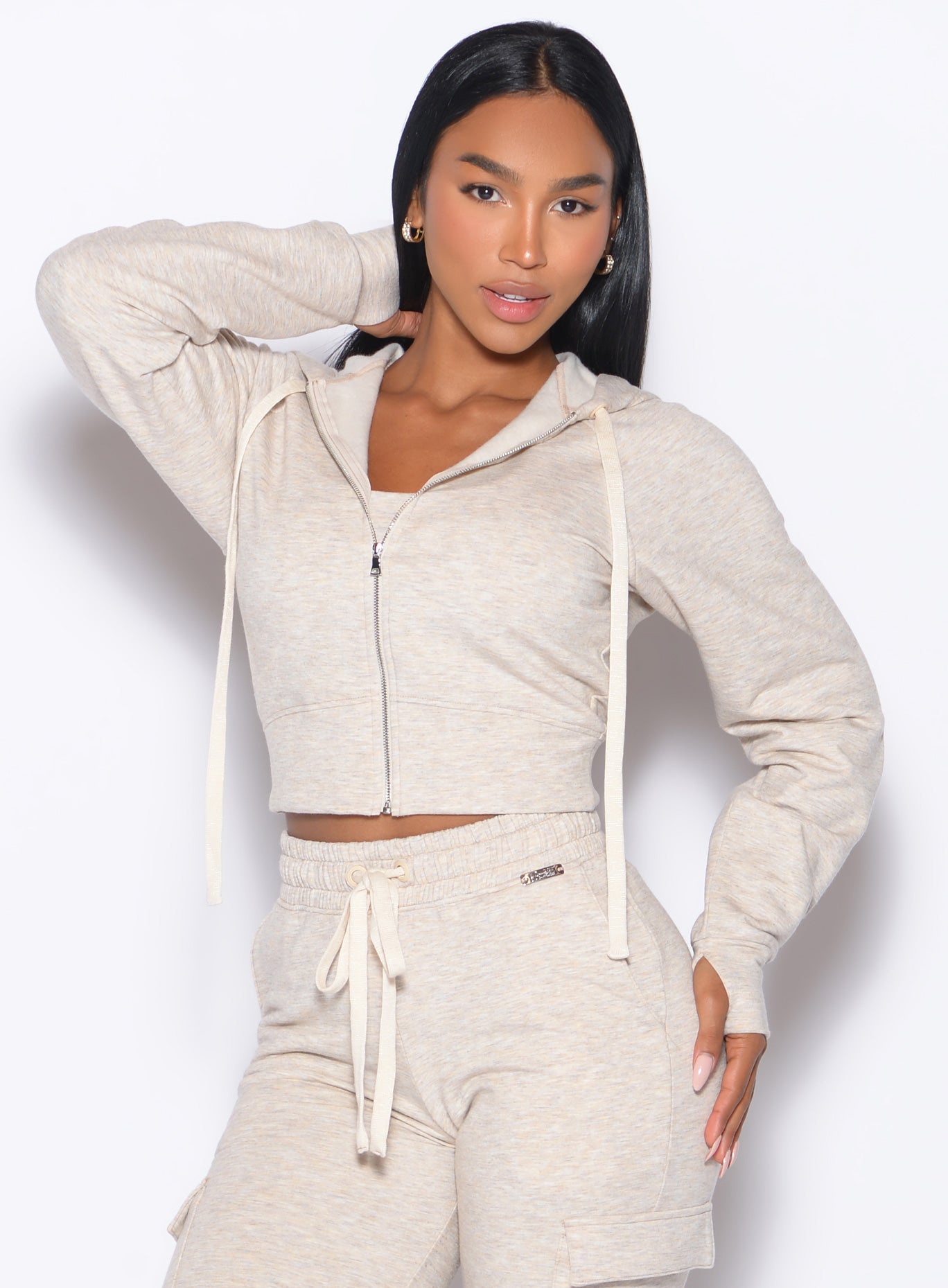 Heathered Oatmeal Sweat Hoodie featuring plush fleece, thumbholes, and a relaxed lounge fit.