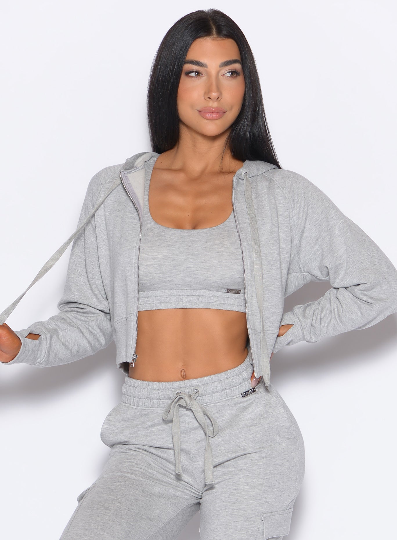 Light heather grey Sweat Hoodie in a relaxed fit fleece, perfect for cozy post-gym lounging.