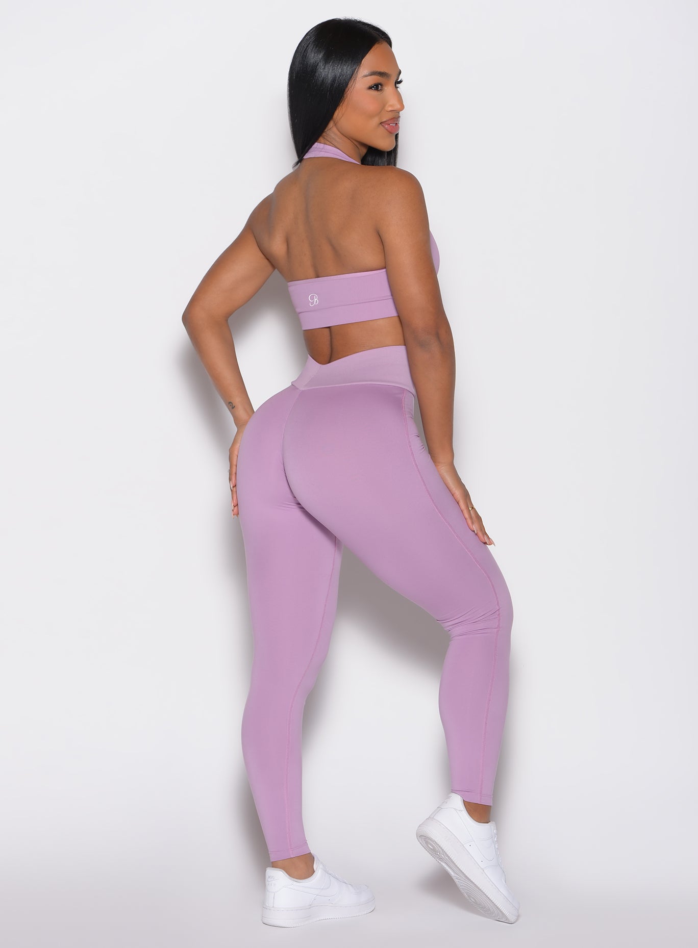 Smokey Grape Figure Butt Lift Leggings featuring a waist-snatching V-back and internal scrunch.