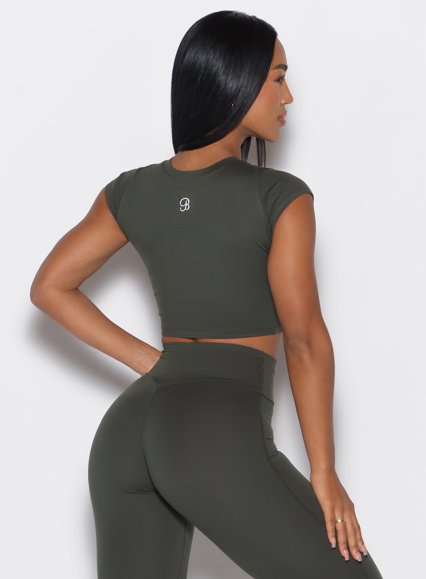 Deep Ivy Fit Fam Active Tee with cap sleeves and a cropped waist for a sculpting gym fit.
