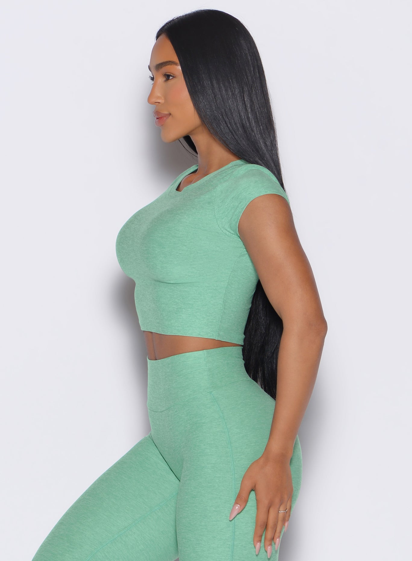 Sage Fit Fam Active Tee with capped sleeves and round neck for a sculpted gym look.