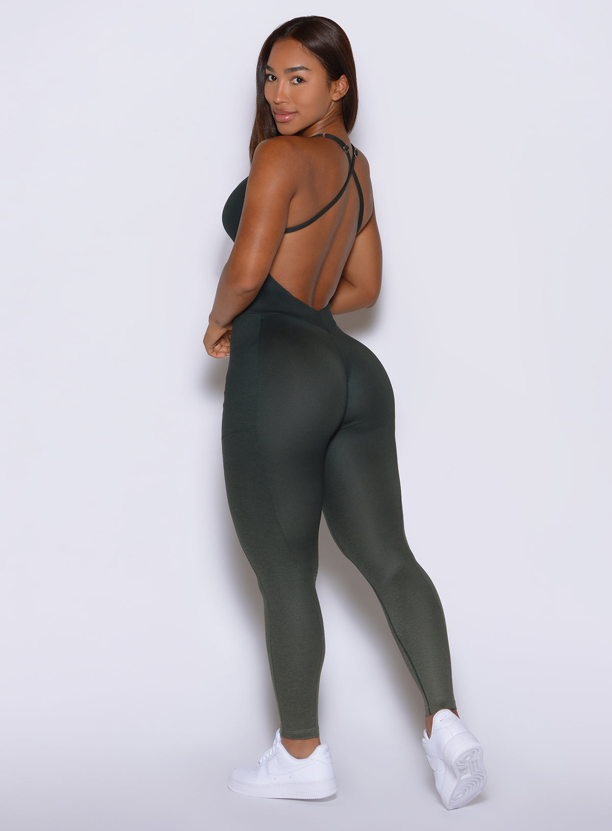 Bombshell Sportswear Flatter Bodysuit in Ombre Fern featuring delicate cross-strap back detail.