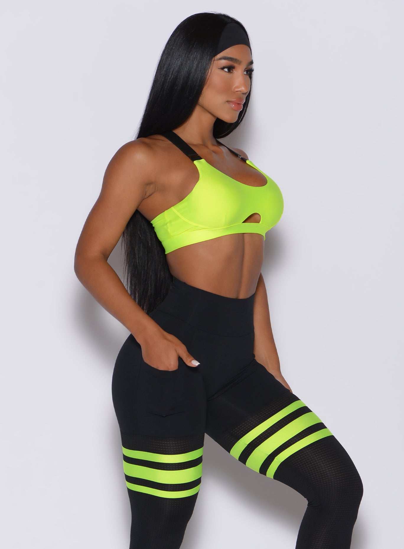 Neon Yellow Glow Sports Bra with front keyhole and adjustable straps for a gym-ready look.