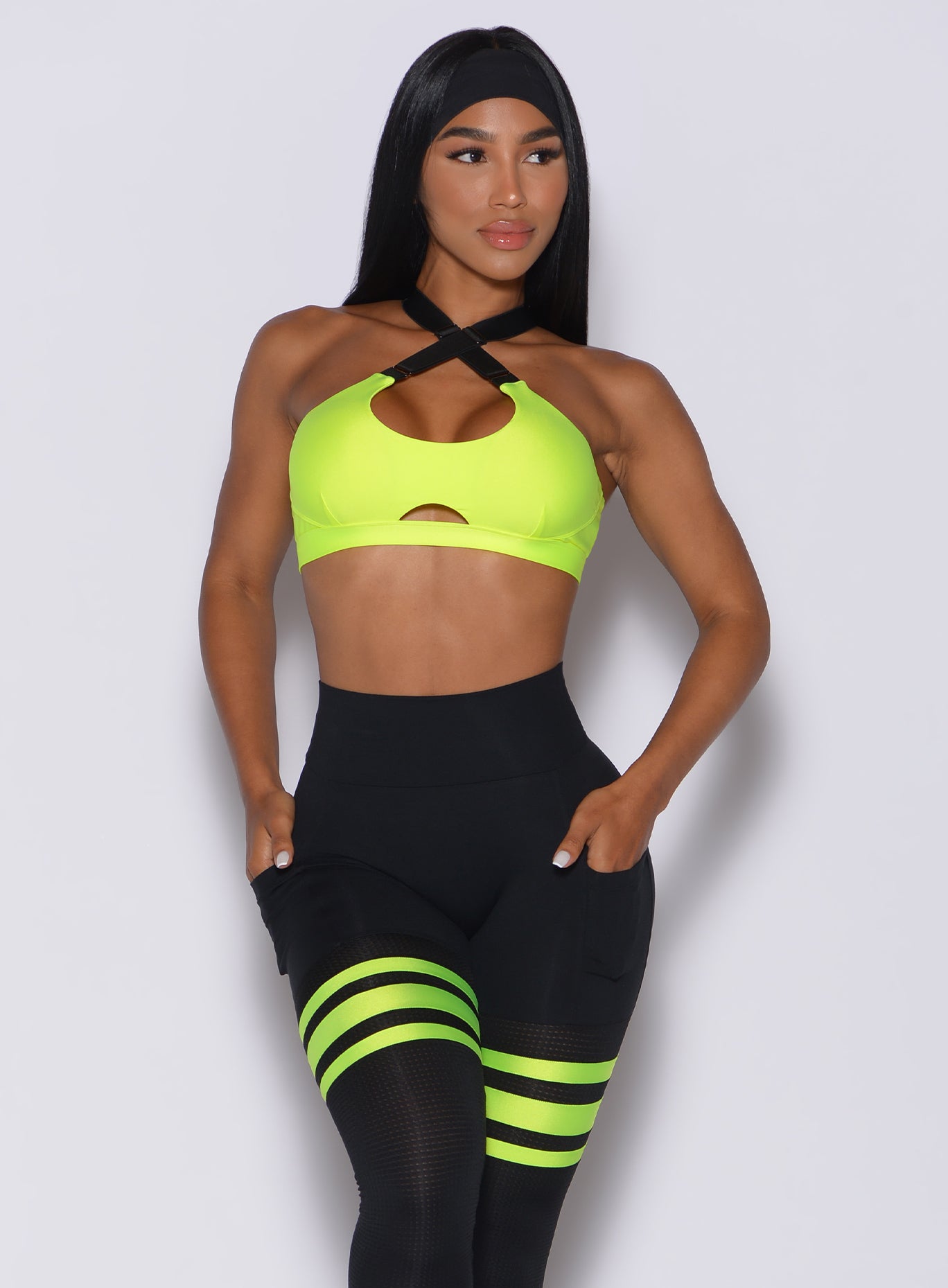 Vibrant Neon Yellow Glow Sports Bra with adjustable crisscross straps for a bold, custom gym fit.