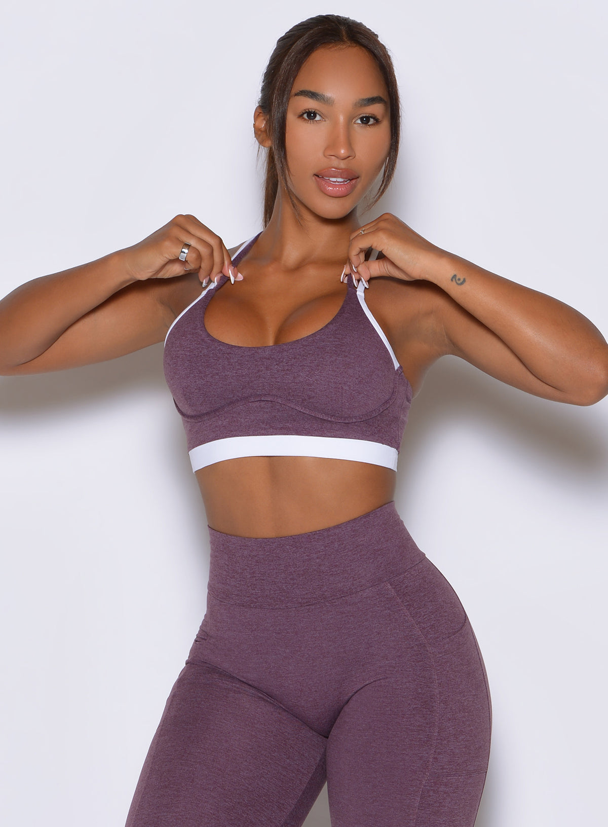 Bombshell Sportswear Regal Purple Gotta Have It Bra highlights double contrast straps.
