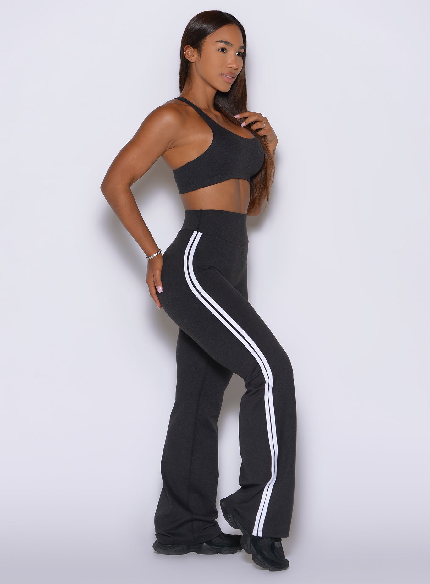 The straight-leg cut creates a clean, elongated profile in Obsidian Black Inline Leggings