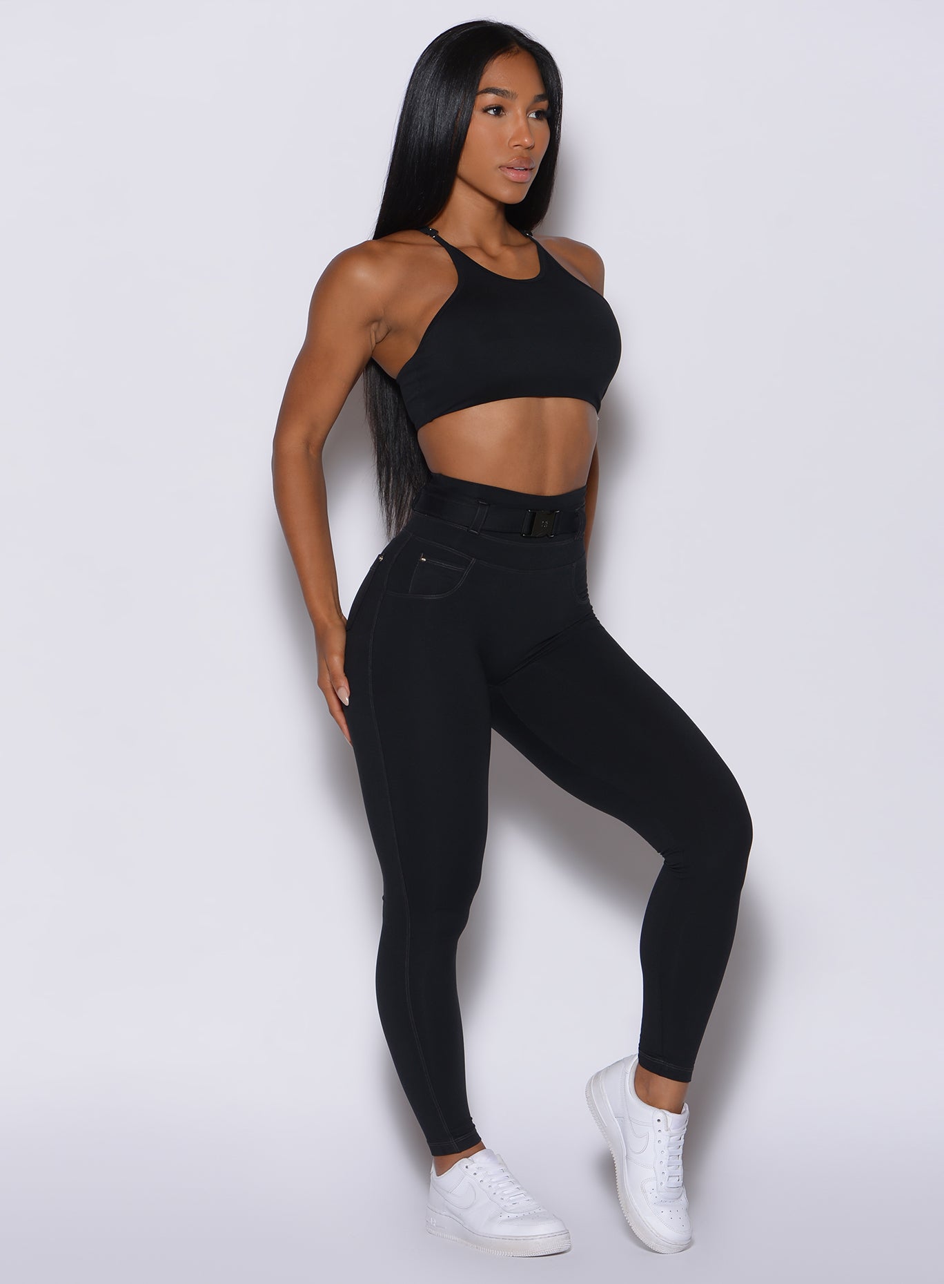 Black denim-inspired Peach Bottoms featuring a high-waist belt and sculpting back pockets.