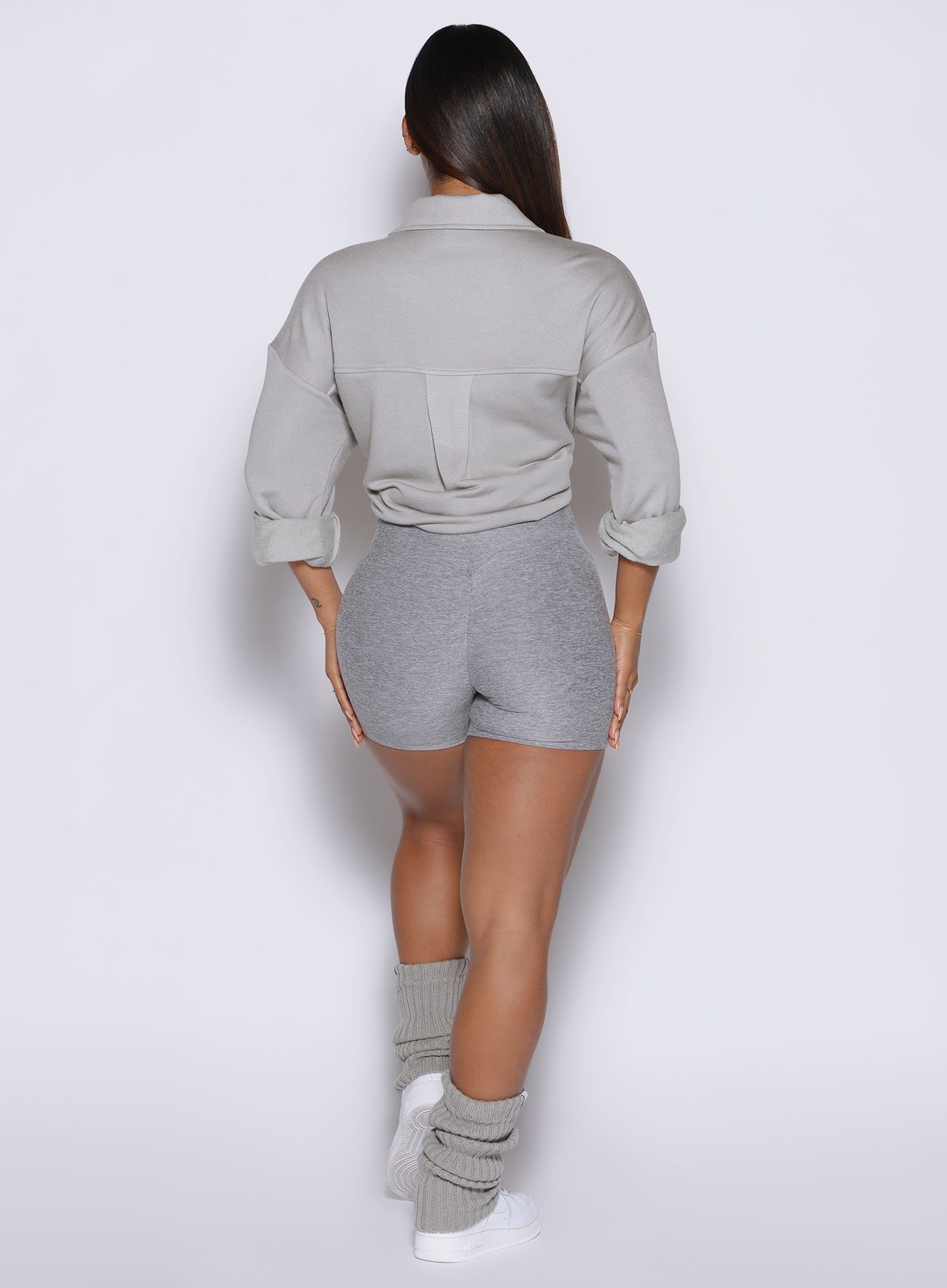model captured from the back wearing the laidback luxe shirt in dark and stormy color