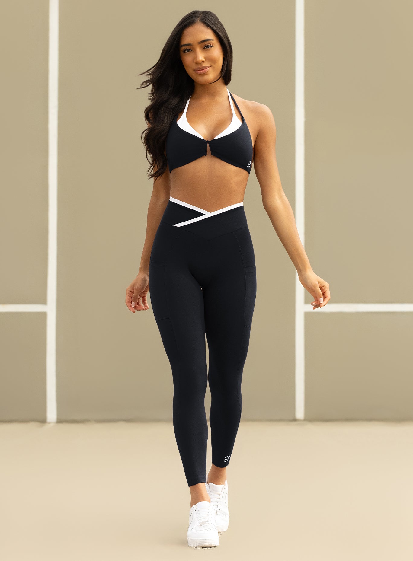 Front shot of Line Contour leggings in black and white with unrestricted movement and comfort