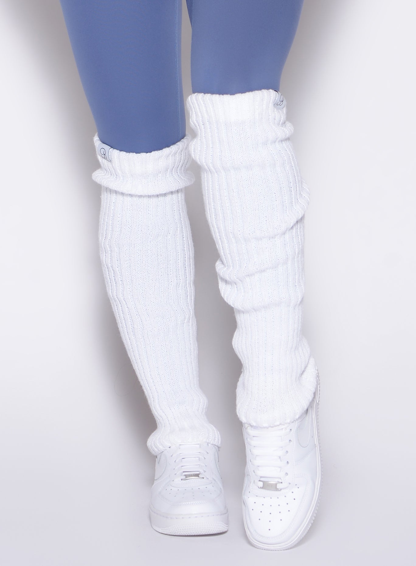 Soft white Luxe Leg Warmers with a plush rib knit and stay-put elastic for cozy gym layering.