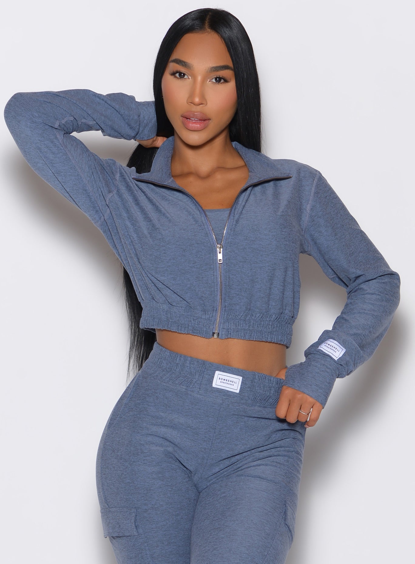 Twilight Cloud Crop Jacket featuring a high mock neck and thumbholes for a sleek athleisure look.