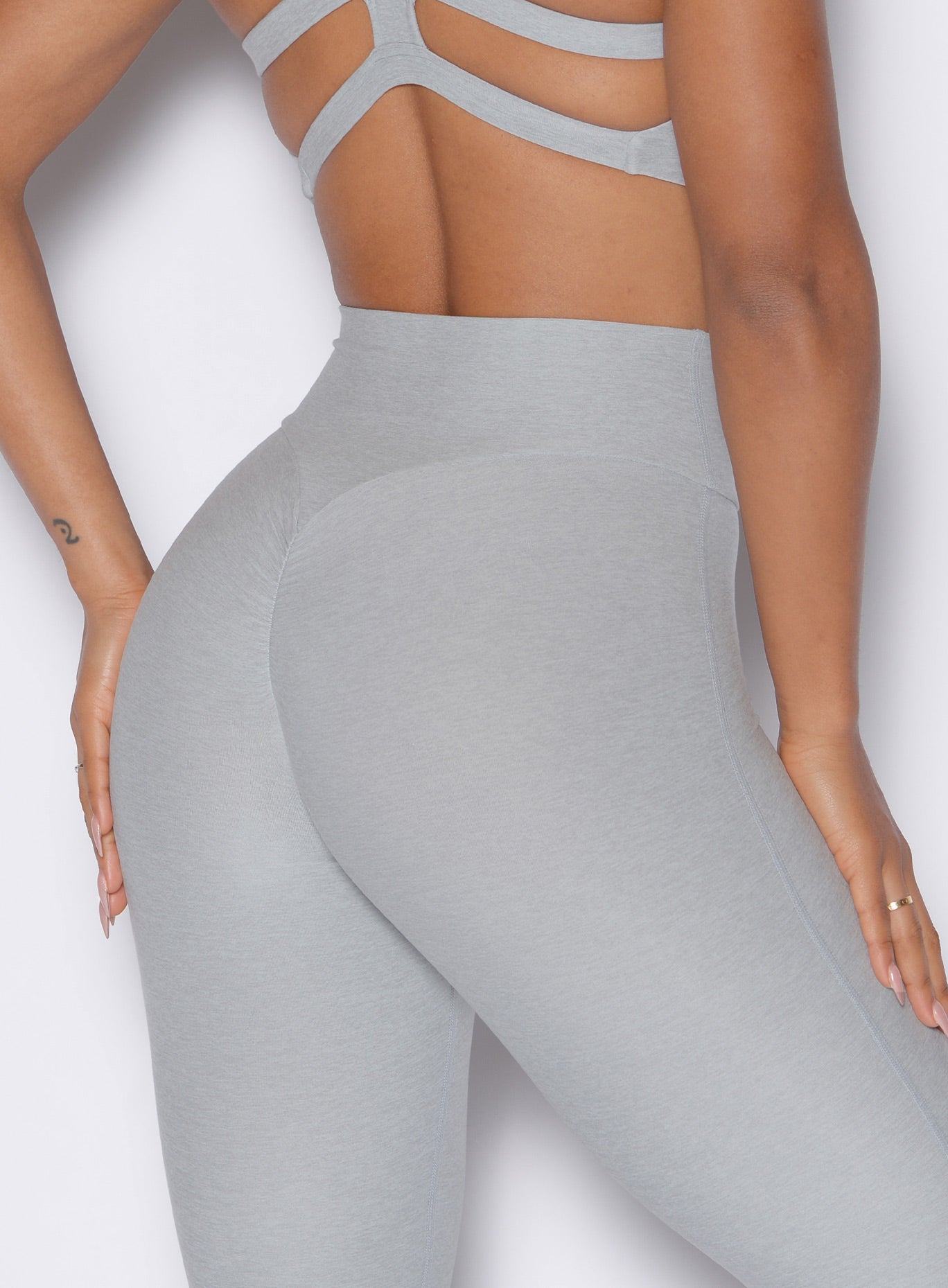 Light Cloud Movement Leggings with heathered fabric and a high-waisted, sculpting gym fit.