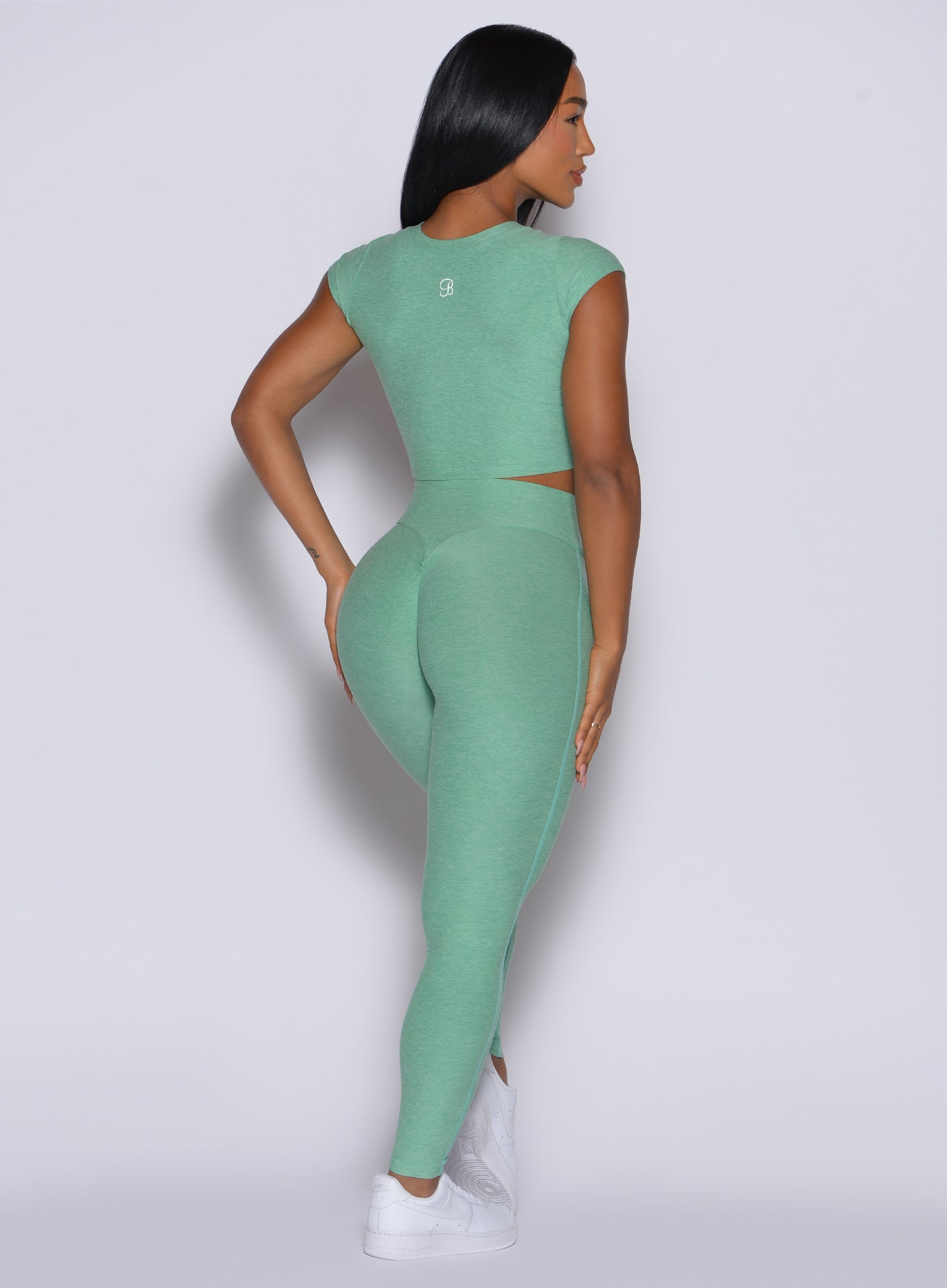 Sage Movement Leggings with a sweetheart butt seam and buttery soft feel for gym training.
