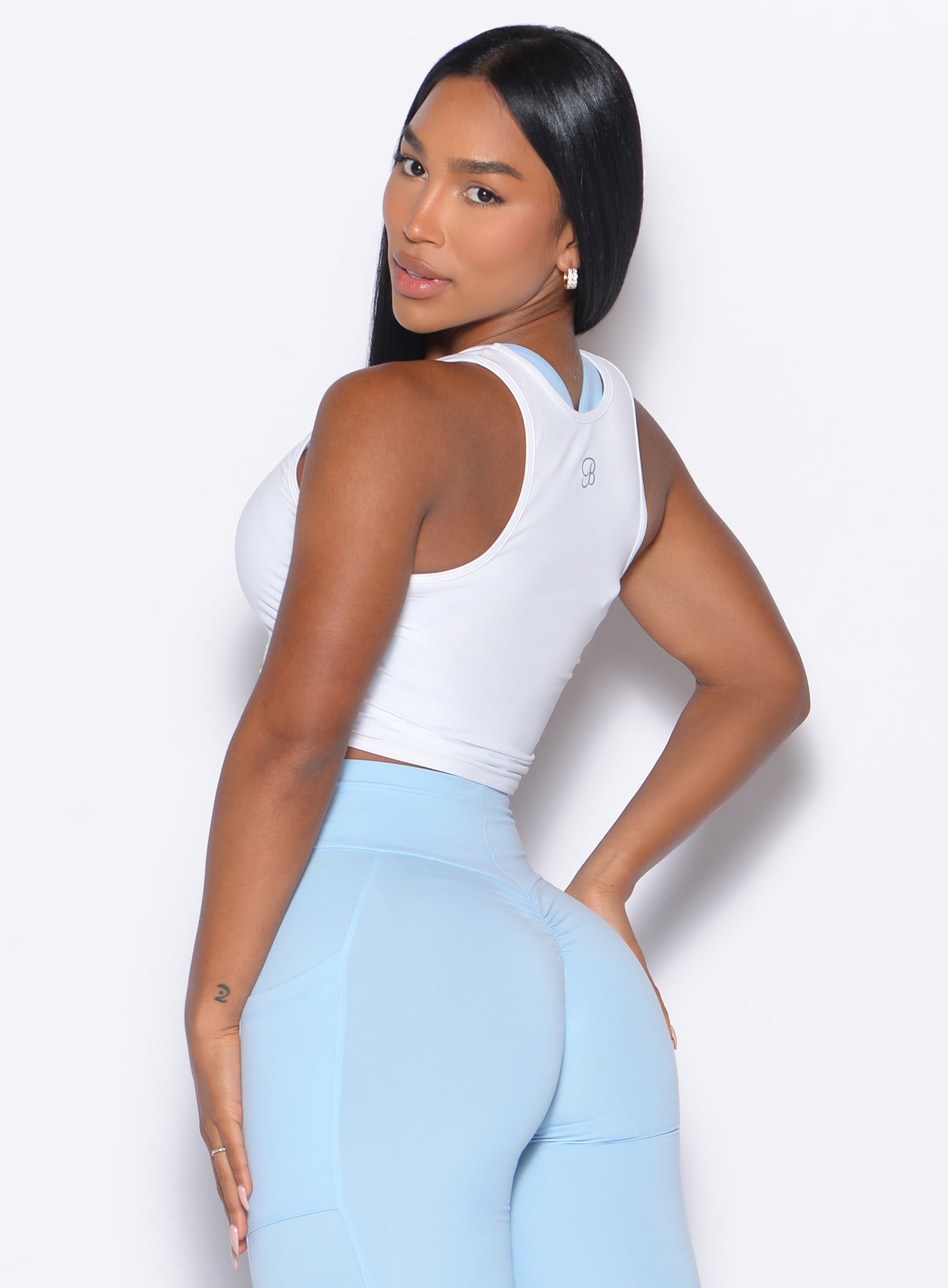 White Muscle Scrunch Tank with side-cinching and a cropped fit for a sculpted, high-performance look.