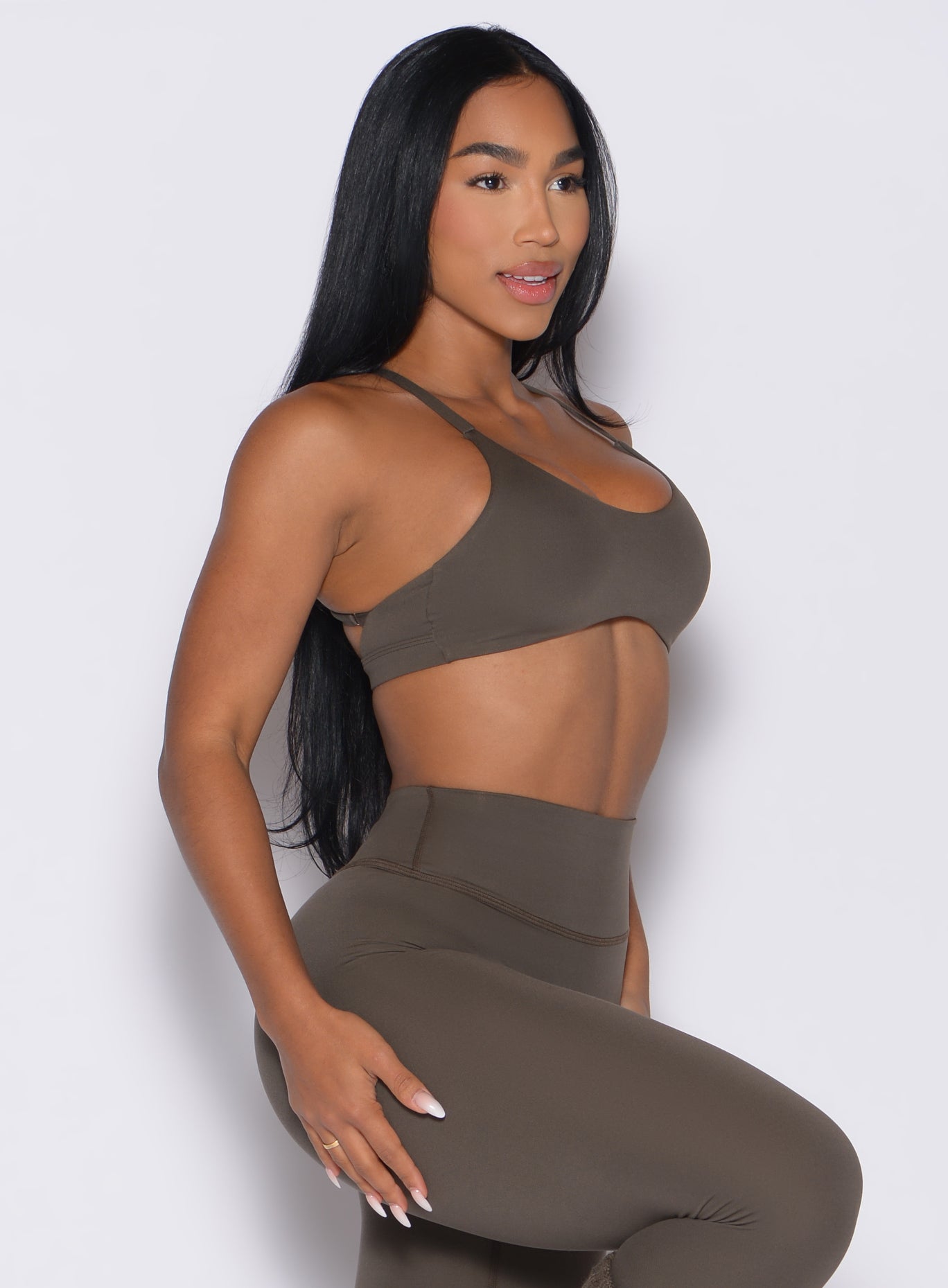 Winter Oak Passion Sports Bra with a strappy open back and curved underbust for high-impact gym sessions.
