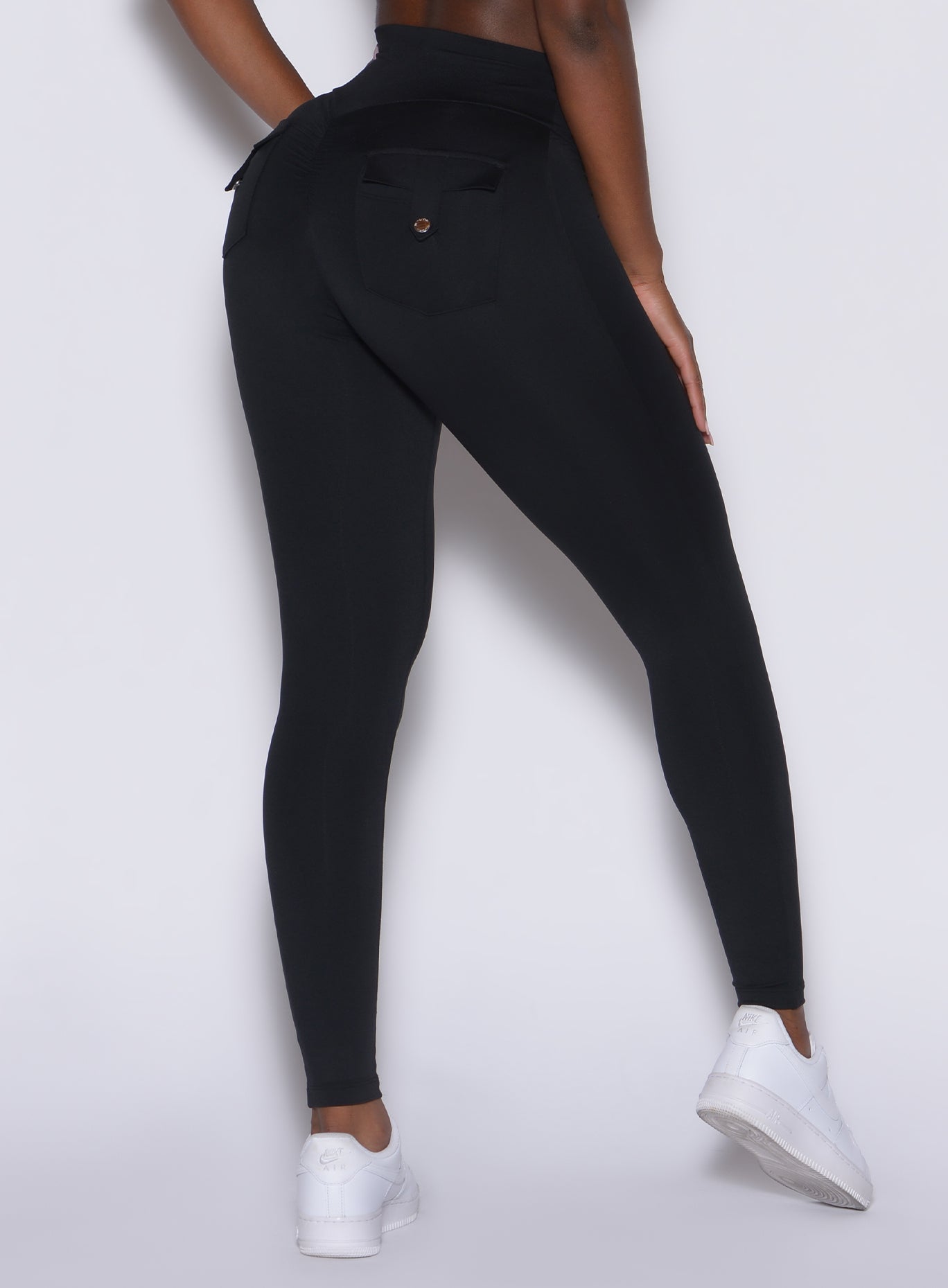 zoomed in back view of our black pocket pop leggings