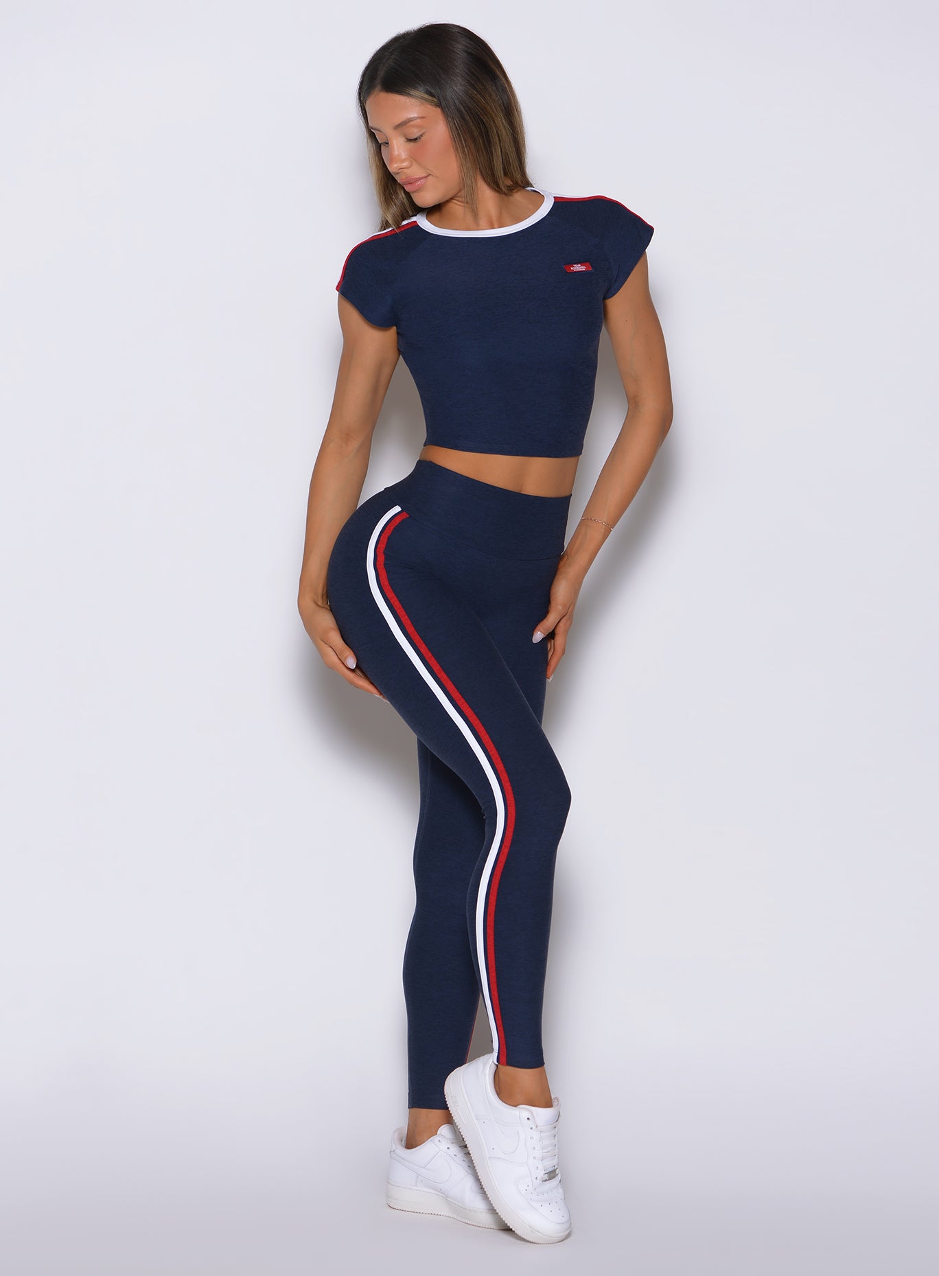 Front-right view of Power Play leggings in Cosmic blue featuring snatched support and smooth contouring