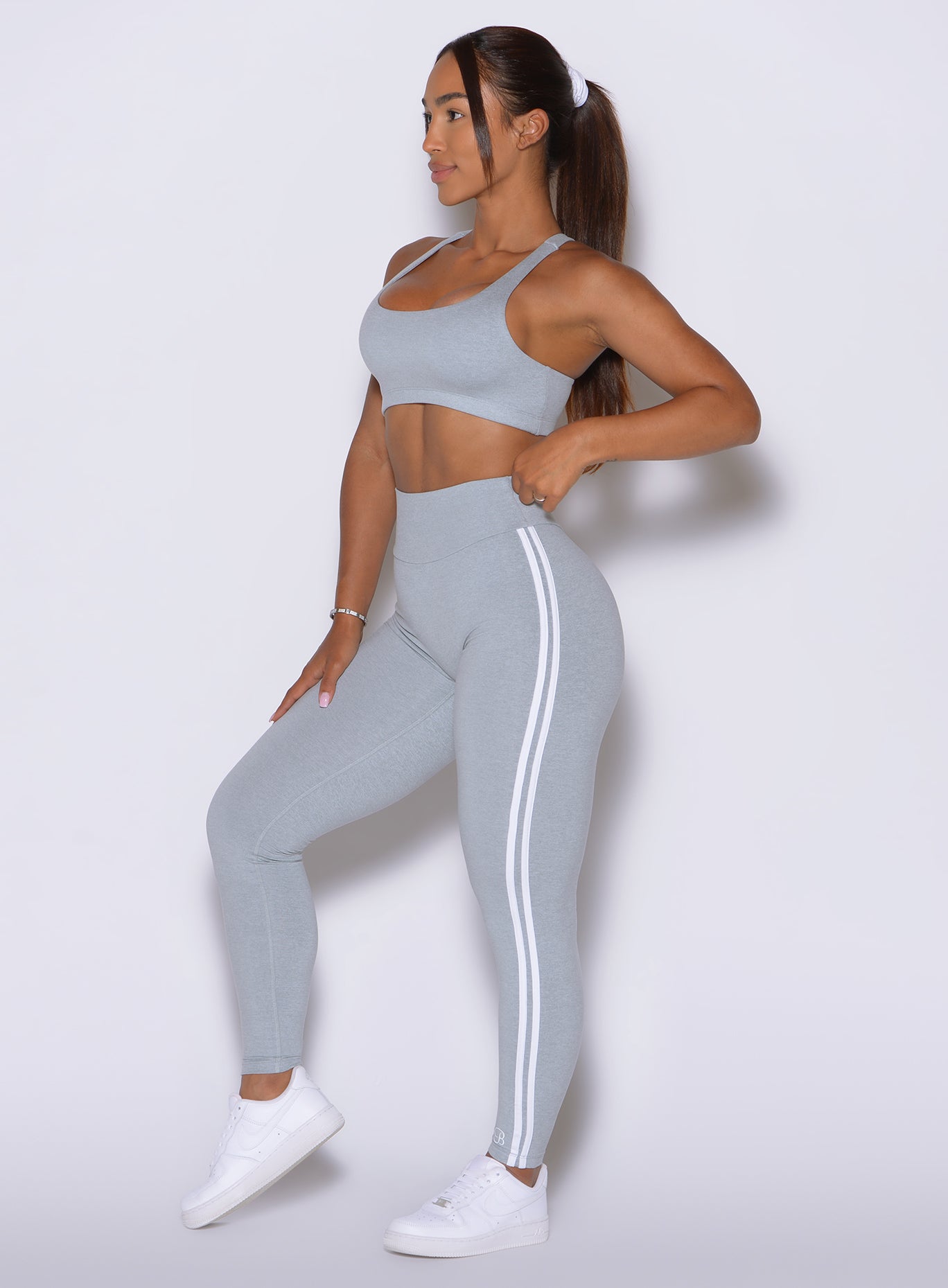 Bold double stripes trace the leg, giving the Ice Queen Power Play Leggings a dynamic side profile