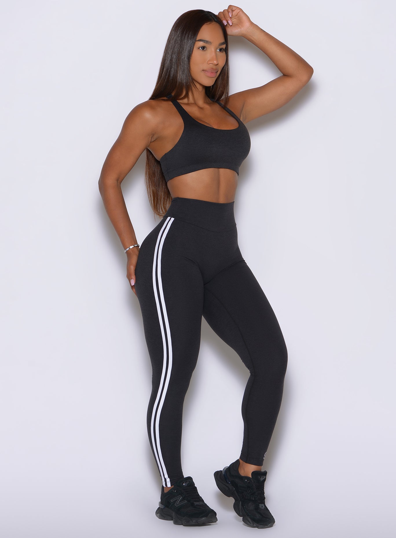 Bold side stripes add athletic definition along the leg of these Obsidian Black Power Play Leggings
